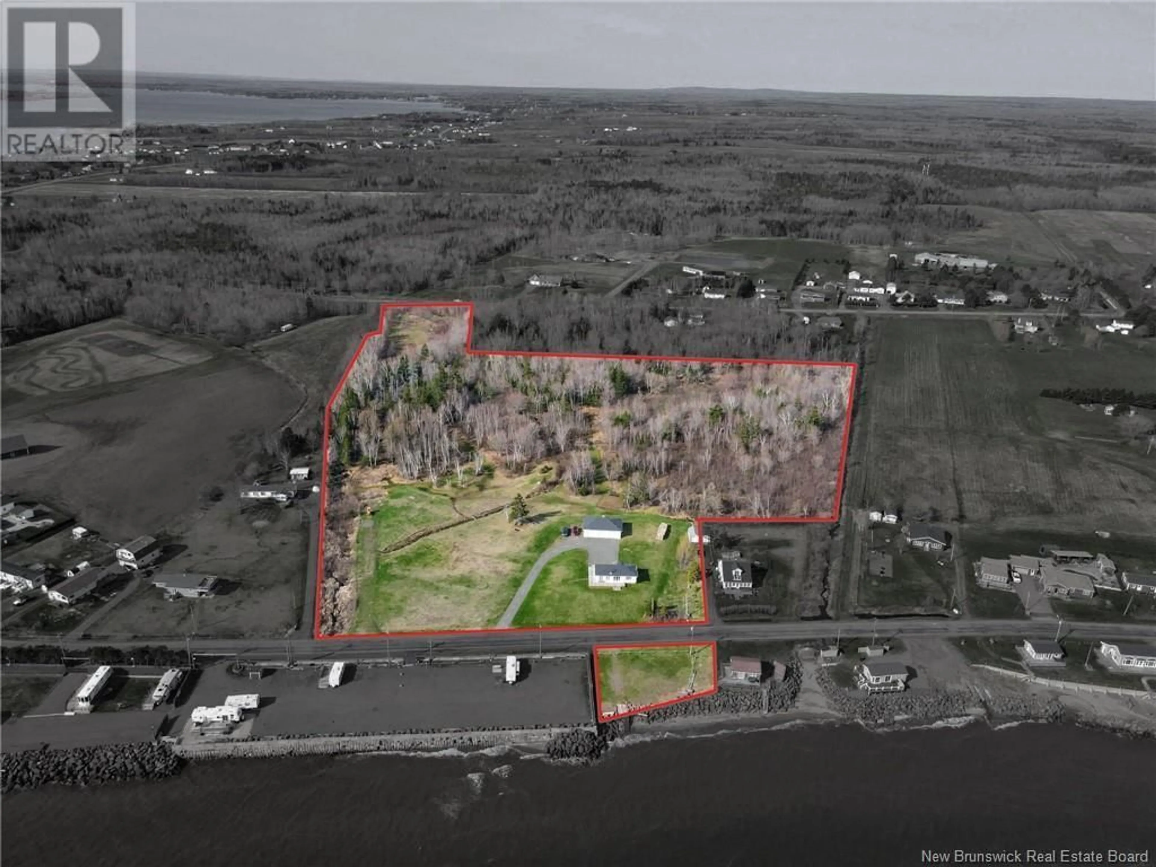 A pic from outside/outdoor area/front of a property/back of a property/a pic from drone, water/lake/river/ocean view for 179 CH DE LA COTE ROAD, Grande-Digue New Brunswick E4R1W8