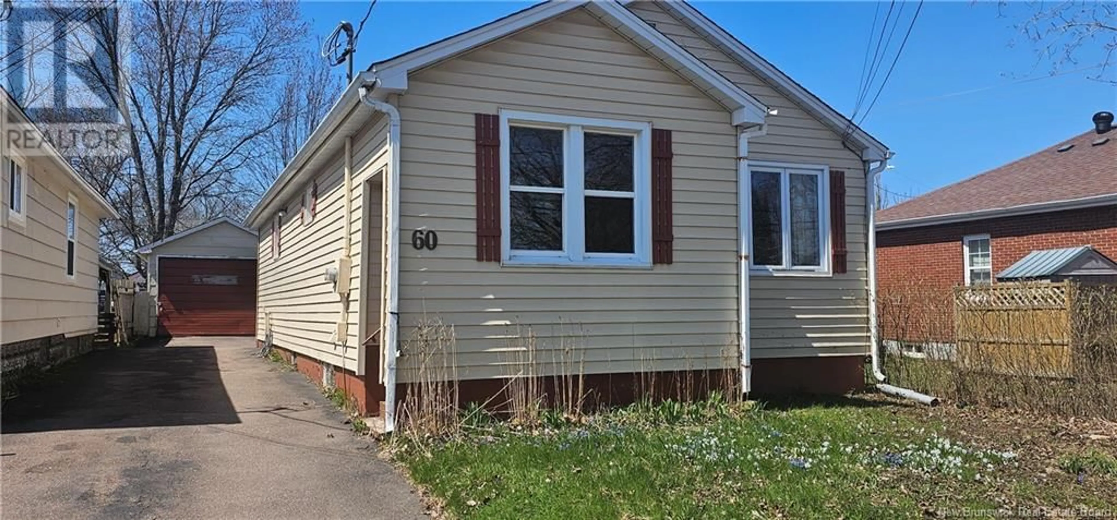 Home with vinyl exterior material, street for 60 MCSWEENEY AVENUE, Moncton New Brunswick E1C7C7