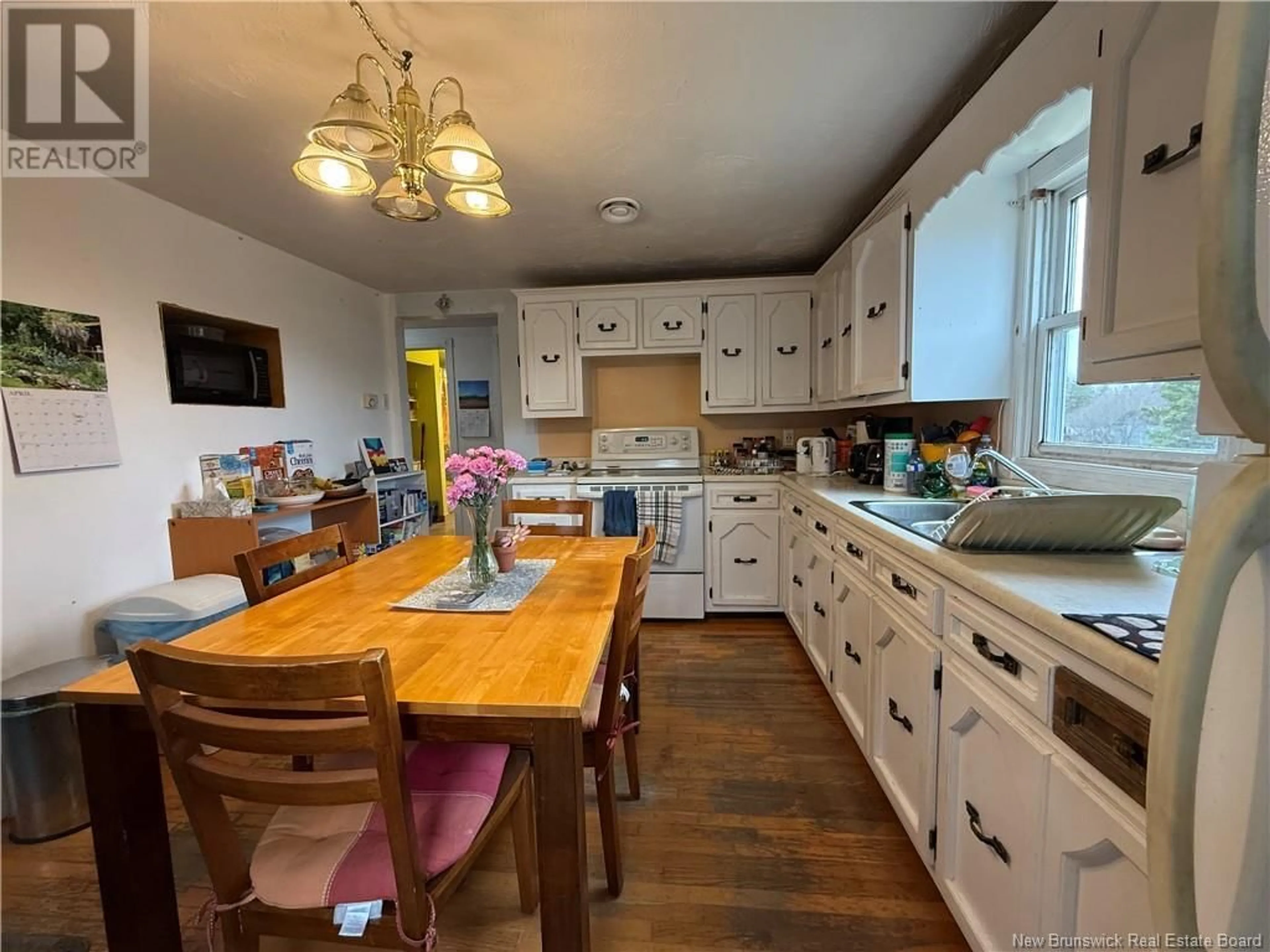 Open concept kitchen, wood/laminate floor for 1198 HAUT-SAINT-ANTOINE, Haut-Saint-Antoine New Brunswick E4V3B9