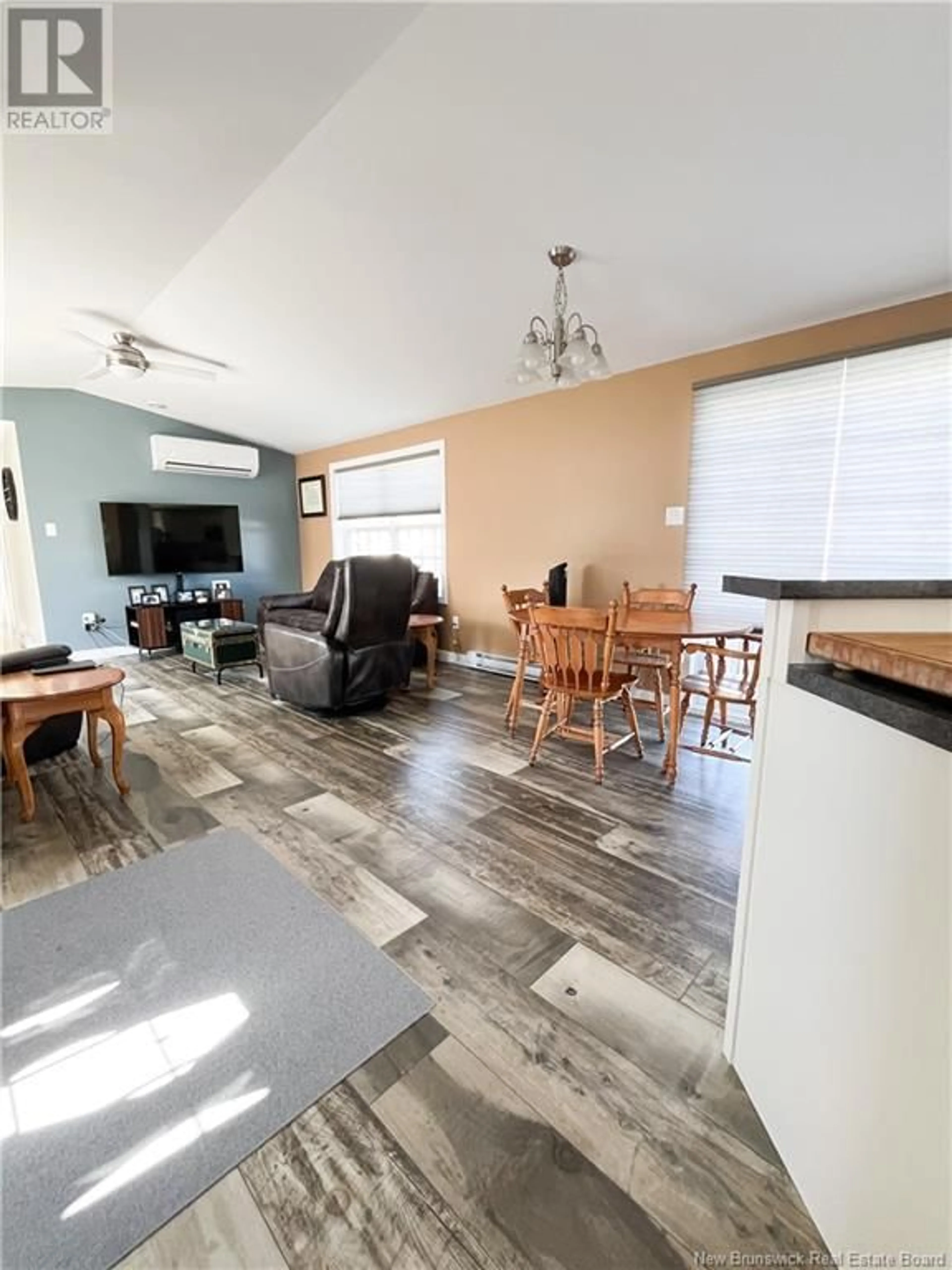 Living room with furniture, wood/laminate floor for 11 RAMSAY STREET, Lincoln New Brunswick E3B6X1