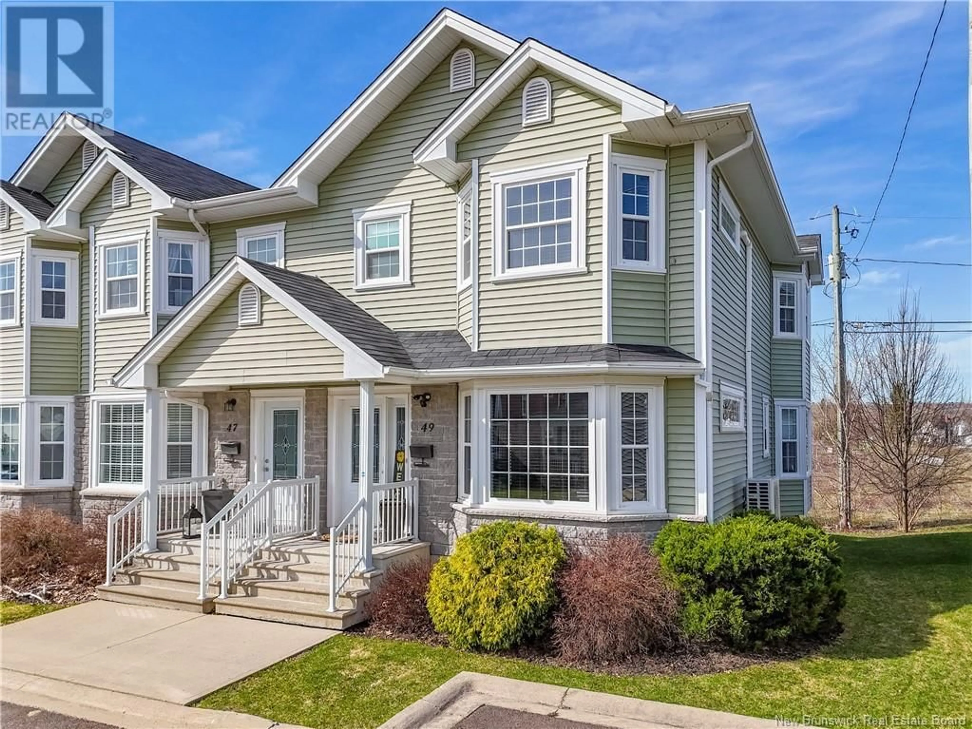 Home with vinyl exterior material, street for 49 COACHMAN DRIVE, Fredericton New Brunswick E3A5W3