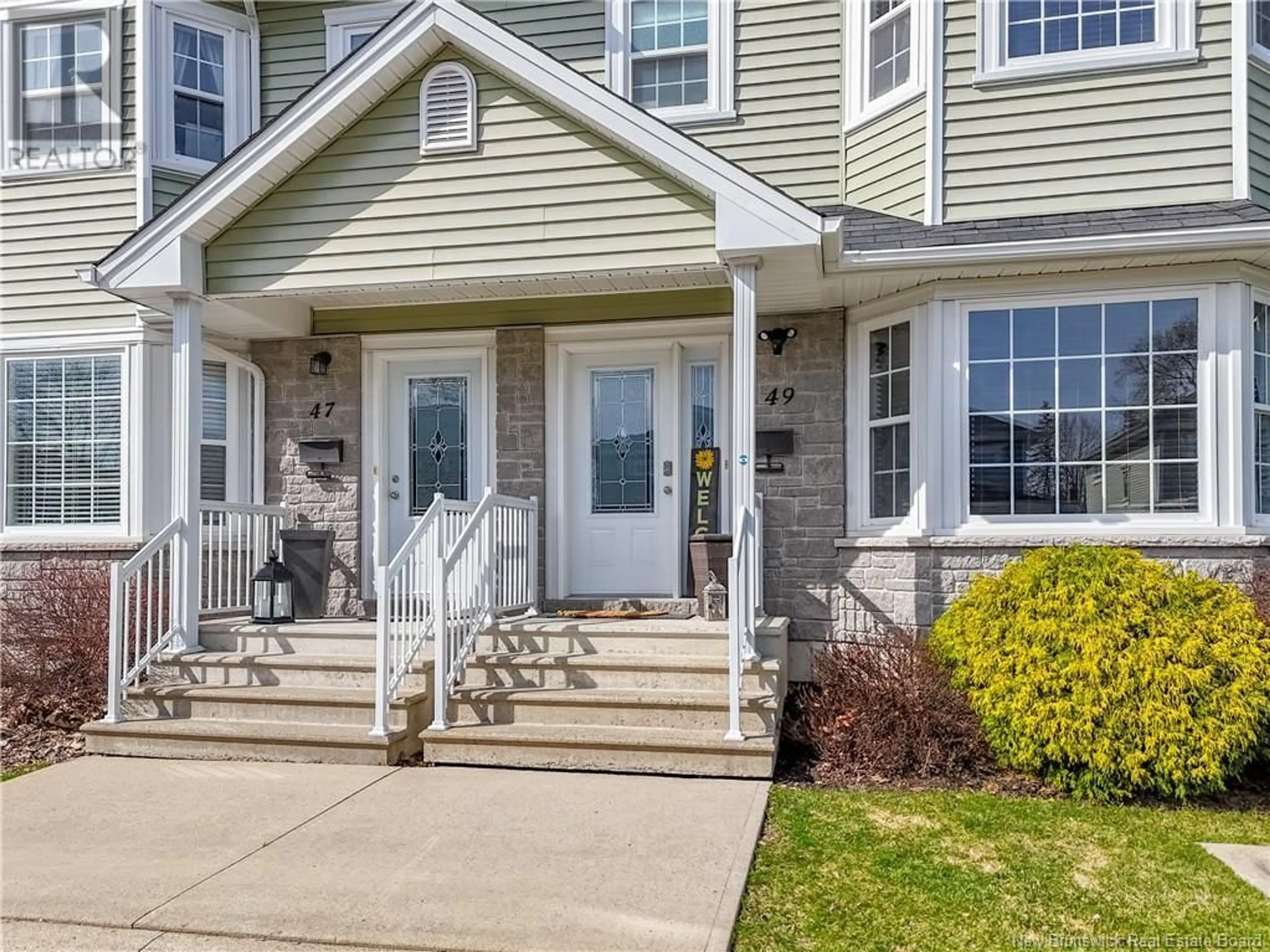 Home with vinyl exterior material, street for 49 COACHMAN DRIVE, Fredericton New Brunswick E3A5W3