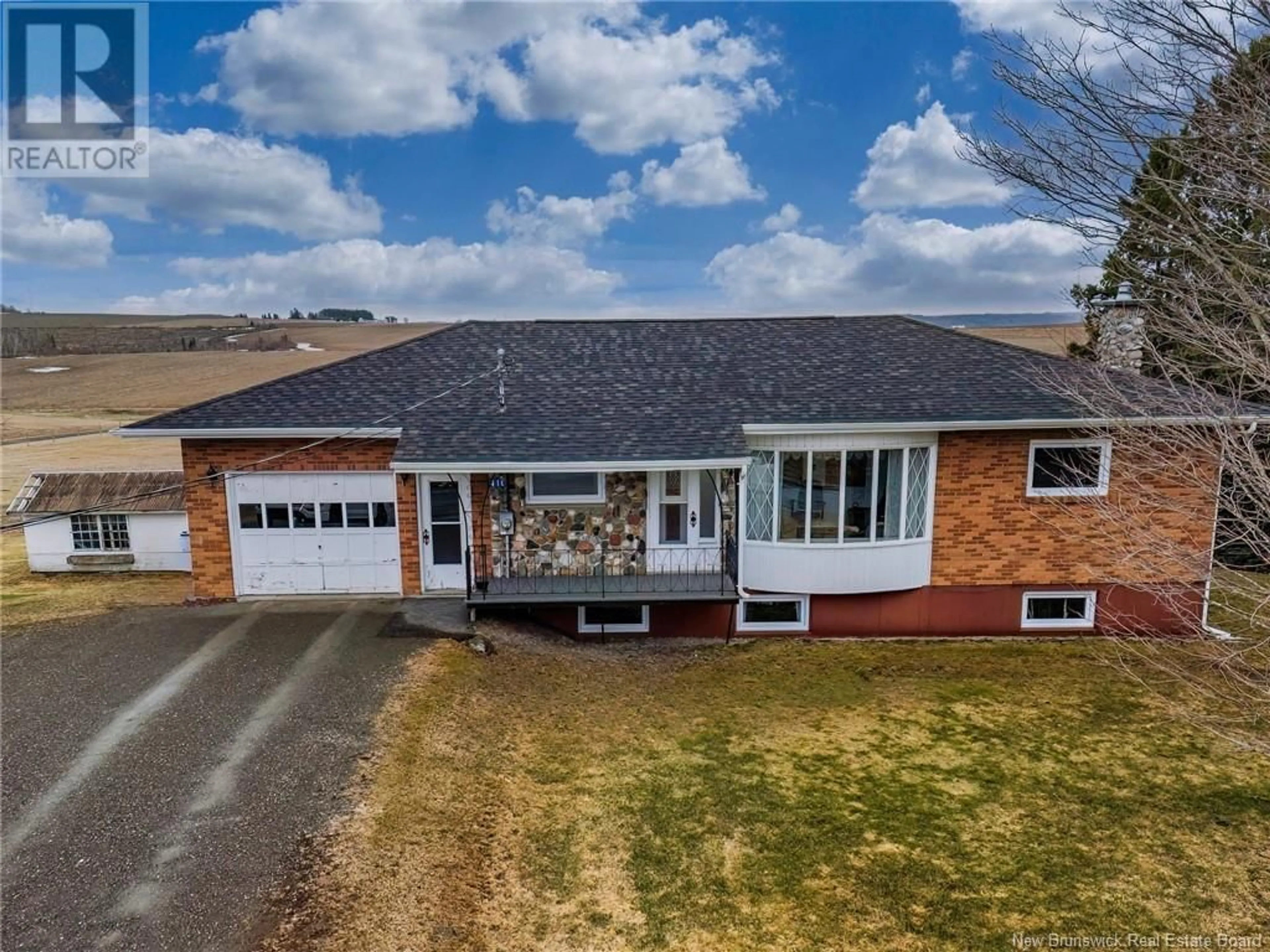 A pic from outside/outdoor area/front of a property/back of a property/a pic from drone, street for 410 LEVESQUE, Saint-André New Brunswick E3Y3C7