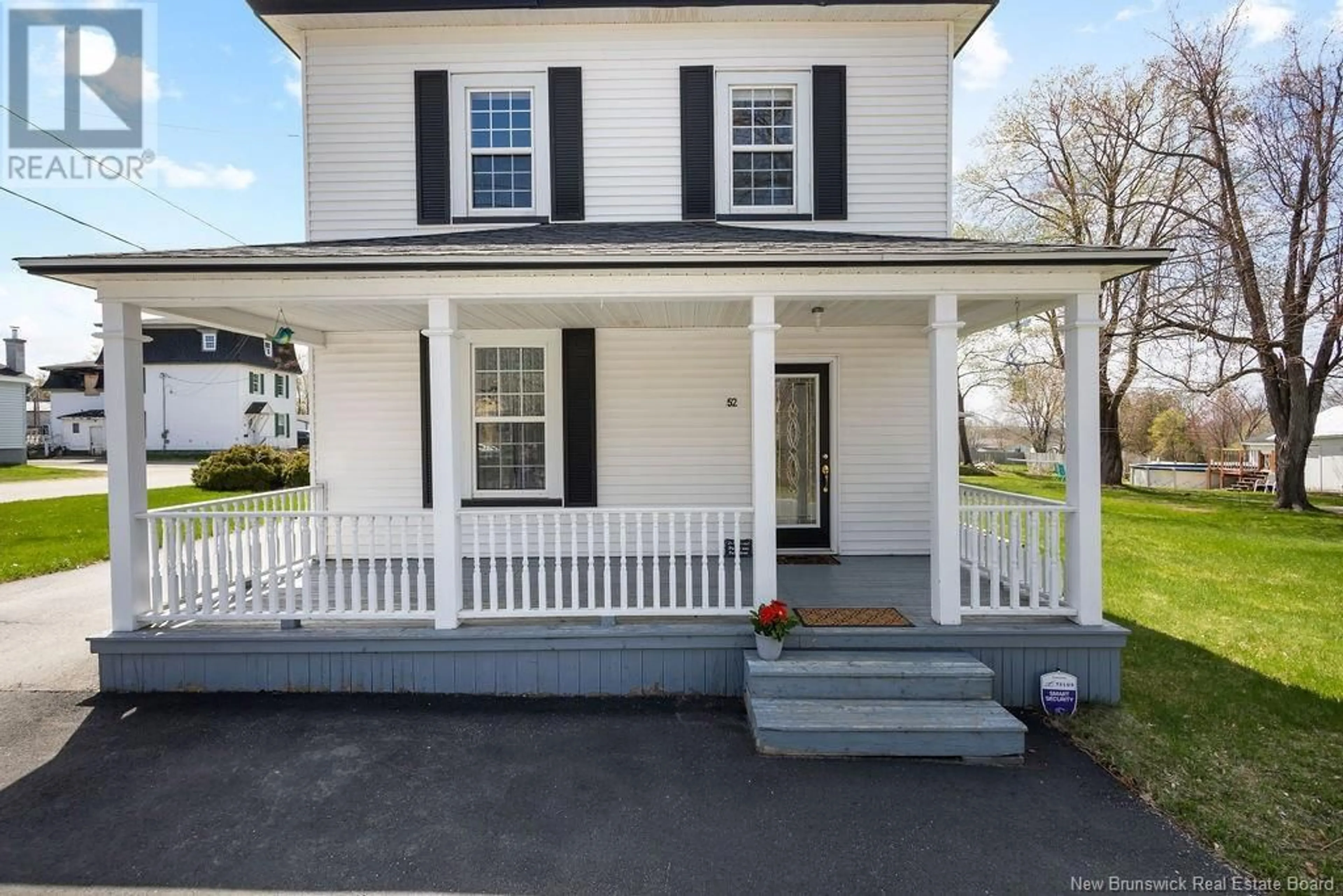 Home with vinyl exterior material, street for 52 PRINCESS STREET, Miramichi New Brunswick E1N2K3