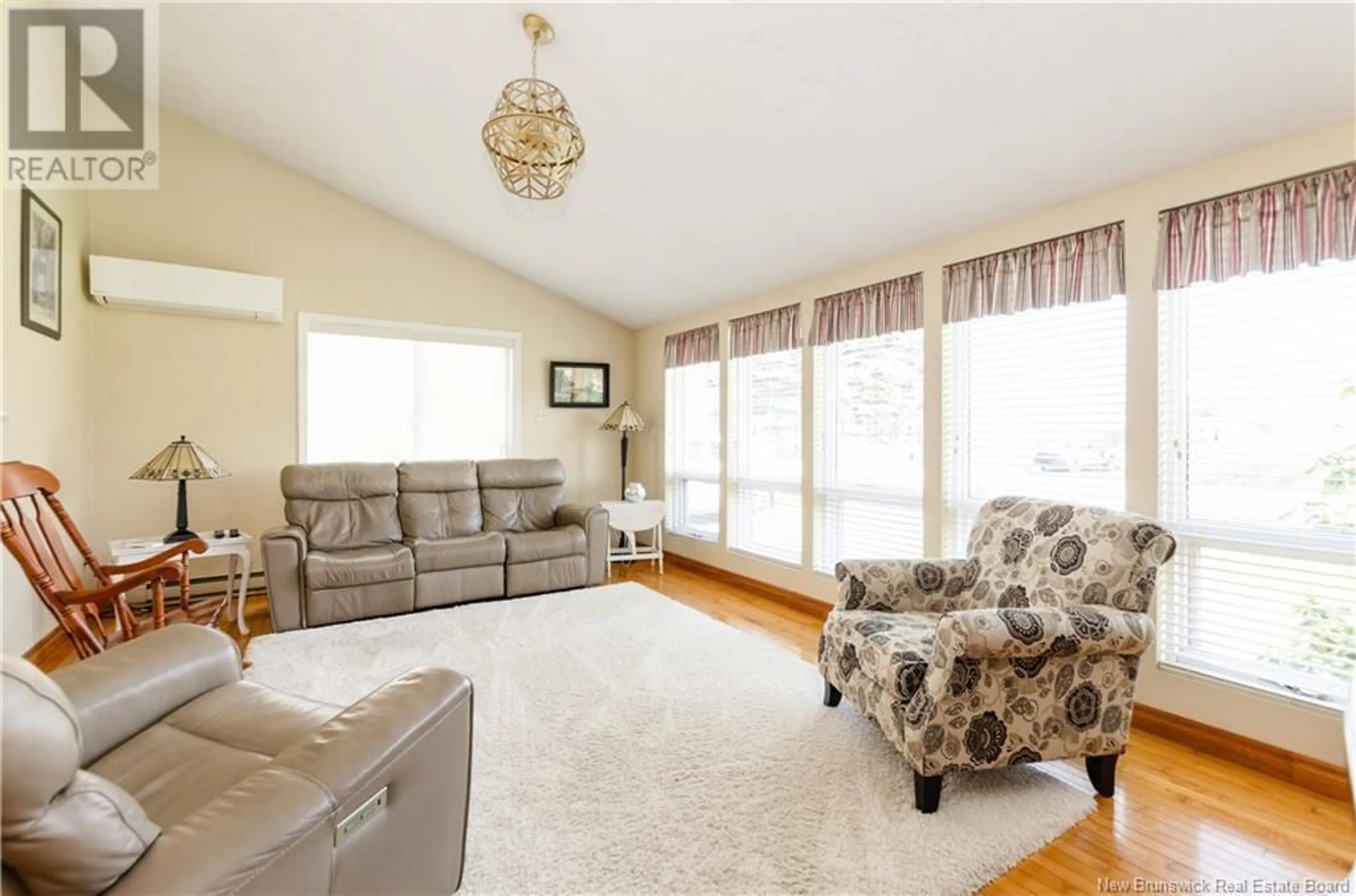 Living room with furniture, unknown for 32 WOODLAWN AVENUE, Moncton New Brunswick E1E2J9