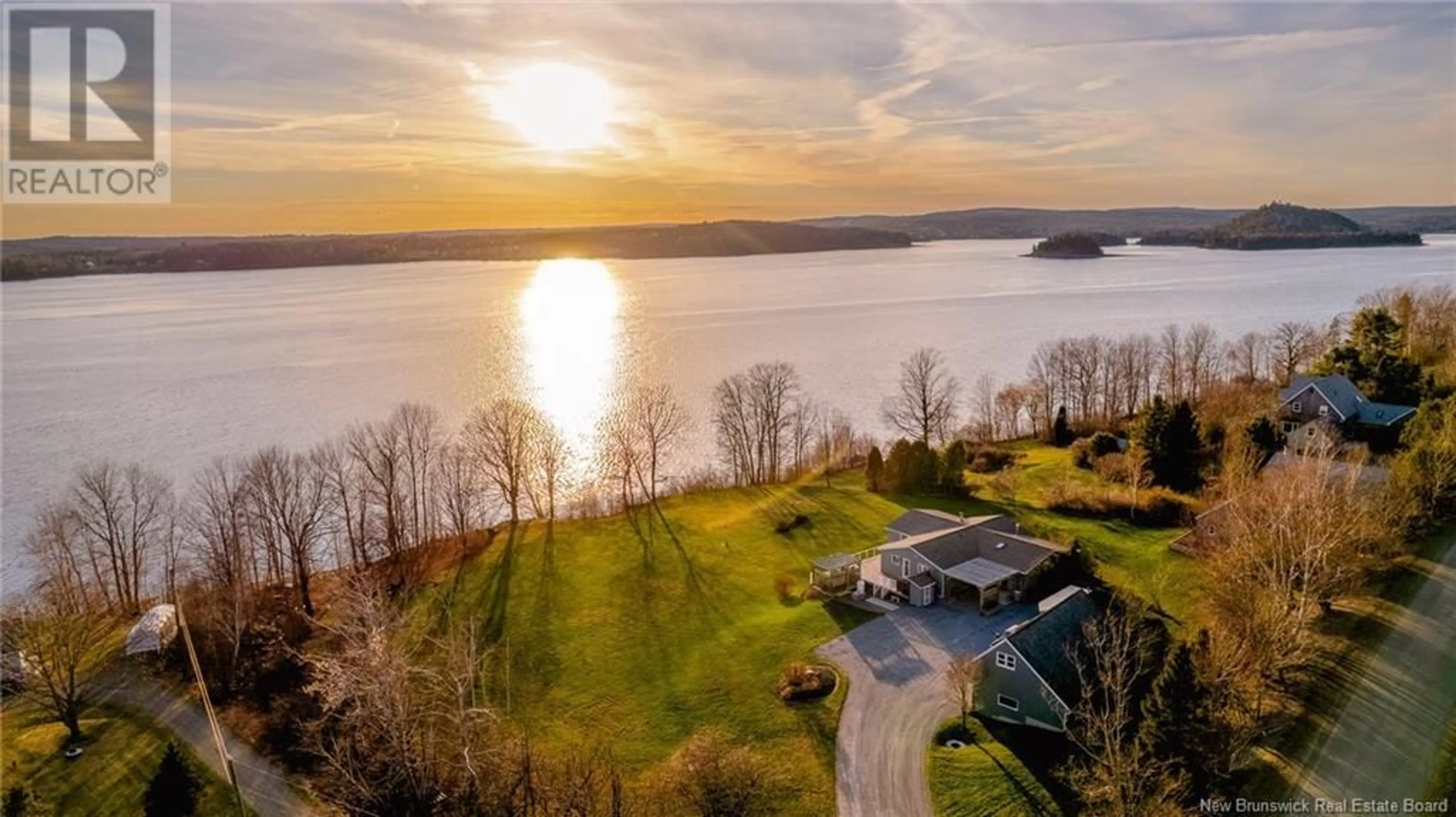 A pic from outside/outdoor area/front of a property/back of a property/a pic from drone, water/lake/river/ocean view for 210 HILLS POINT ROAD, Oak Bay New Brunswick E3L4J2