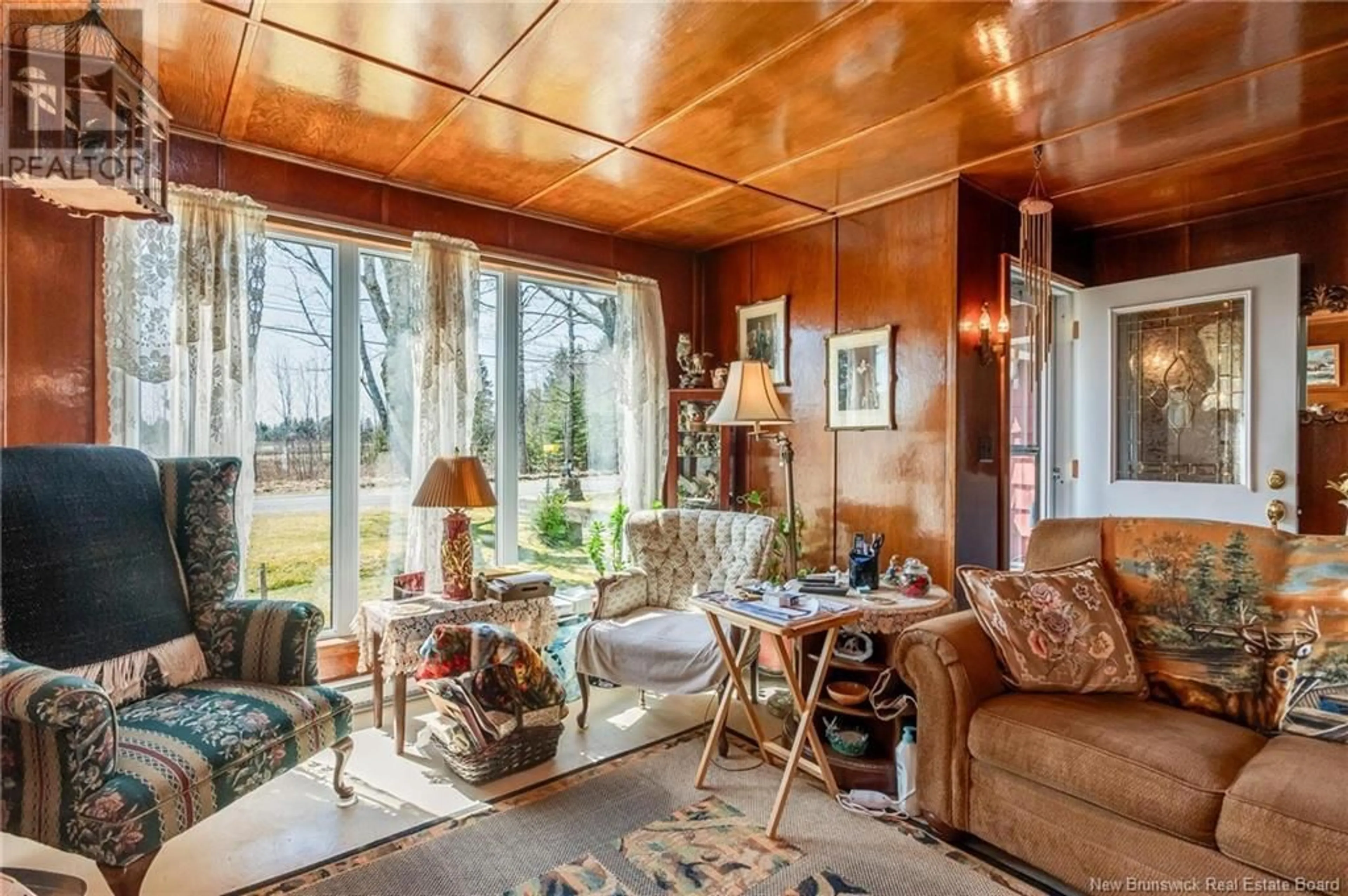 Living room with furniture, wood/laminate floor for 127 MCKAY LOOP ROAD, Pennfield New Brunswick E5H2L1