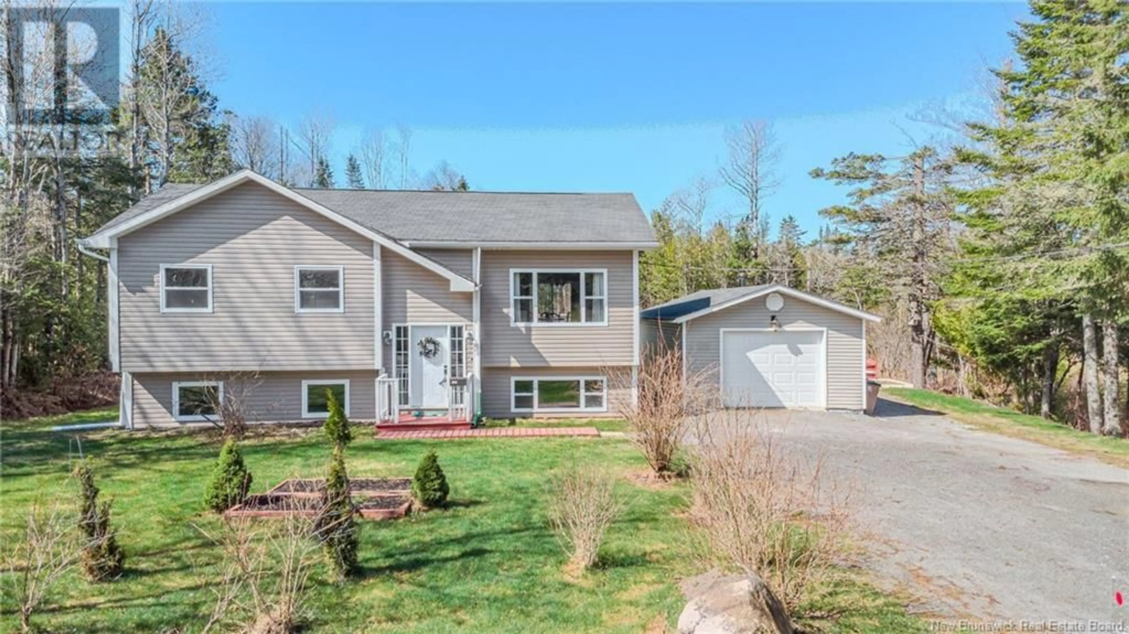 Home with vinyl exterior material, street for 320 NORRIS ROAD, Saint John New Brunswick E2N1G6