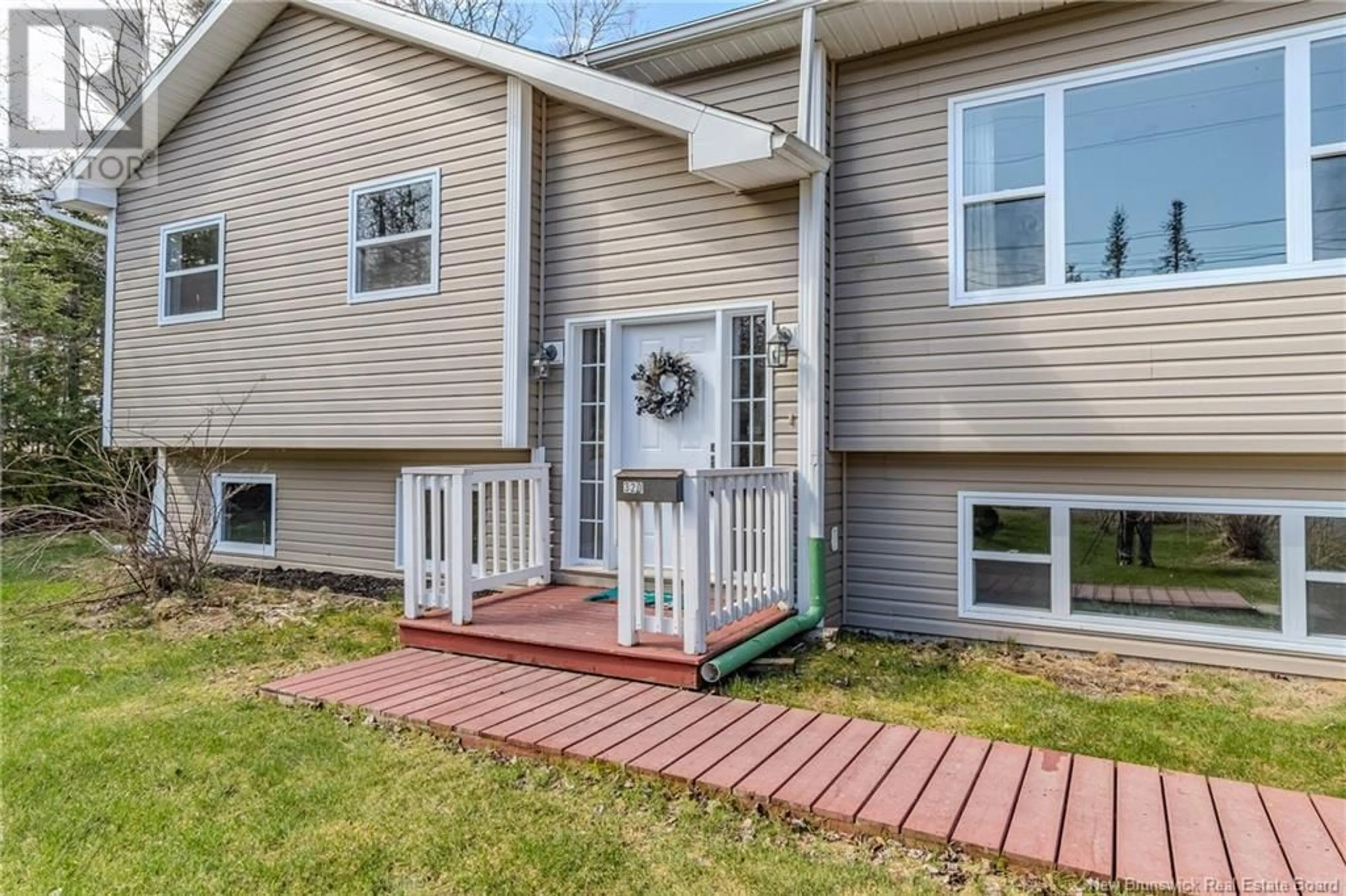 Home with vinyl exterior material, street for 320 NORRIS ROAD, Saint John New Brunswick E2N1G6