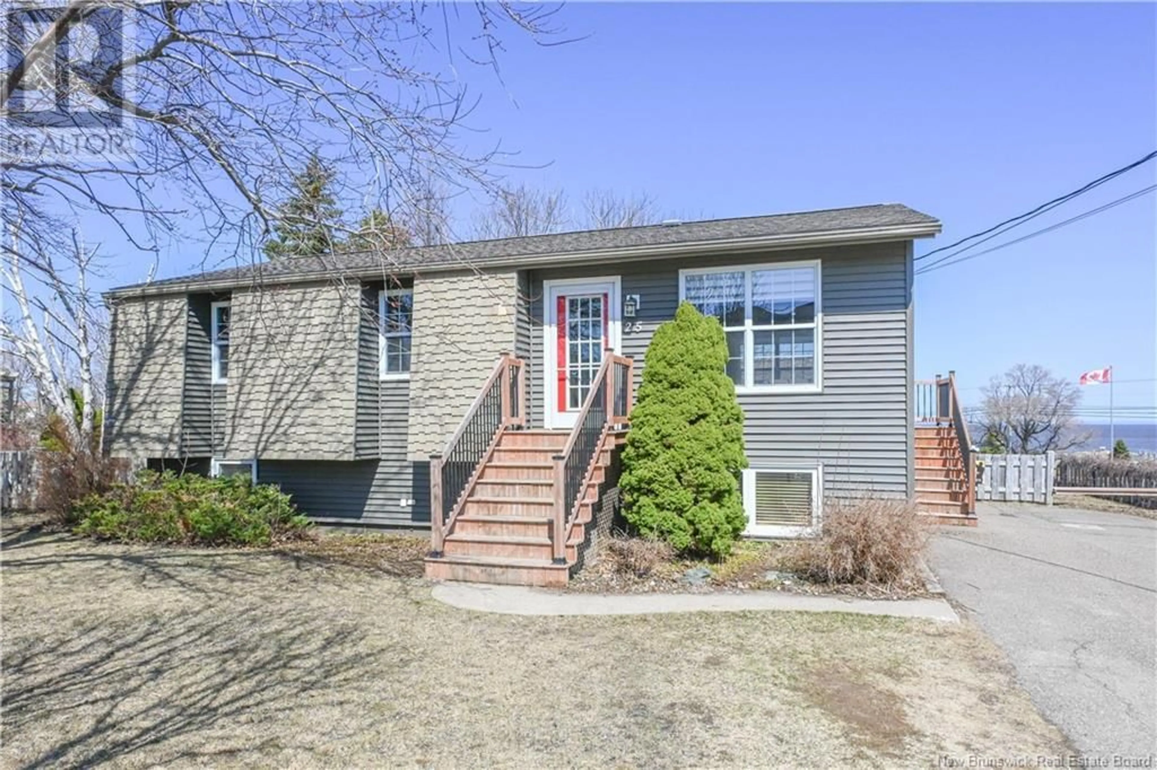 Home with brick exterior material, street for 25 RUE DES ROBINS E., Caraquet New Brunswick E1W1A7