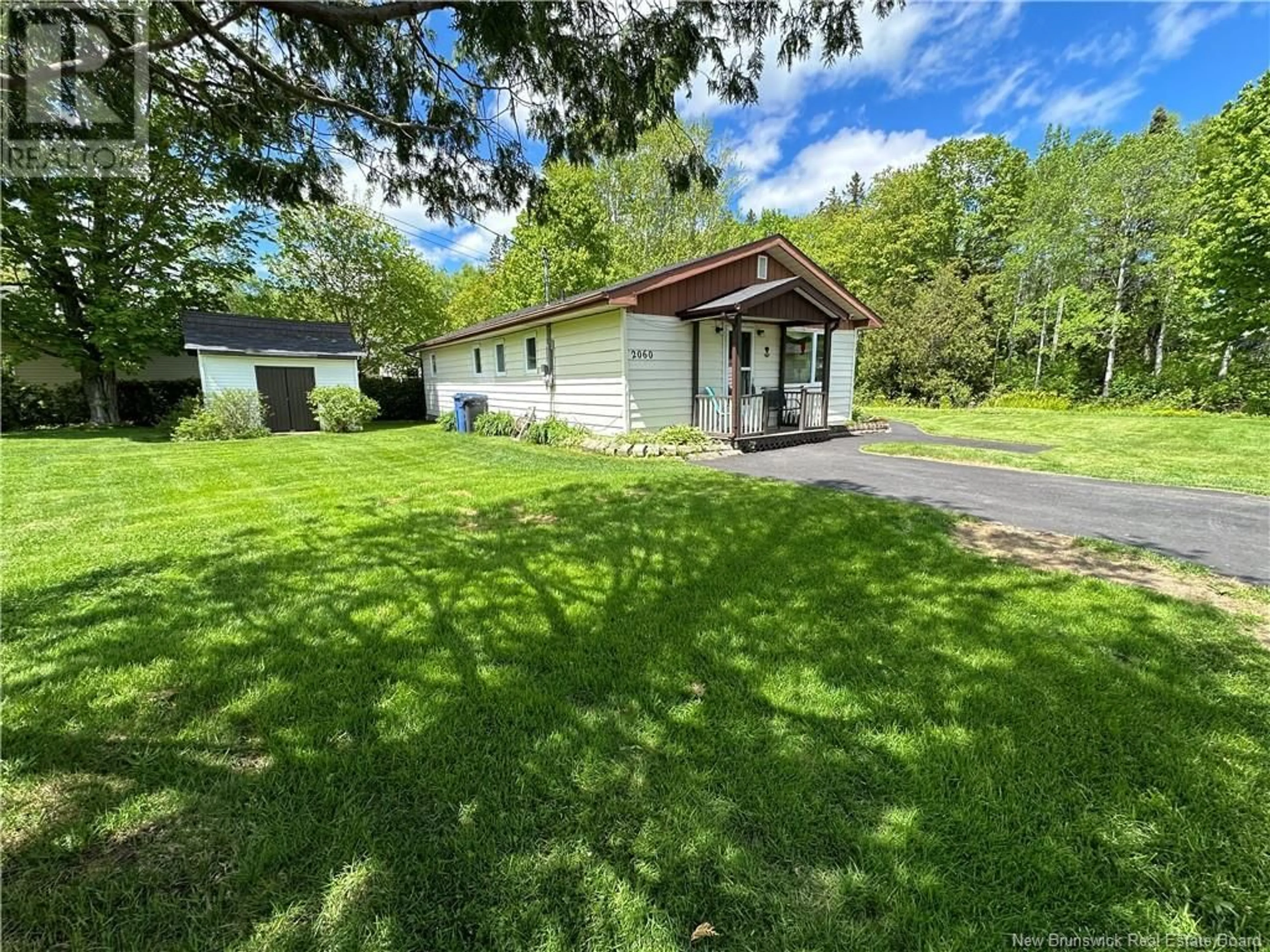 A pic from outside/outdoor area/front of a property/back of a property/a pic from drone, unknown for 2060 MILLSTREAM, Dunlop New Brunswick E8K2K3