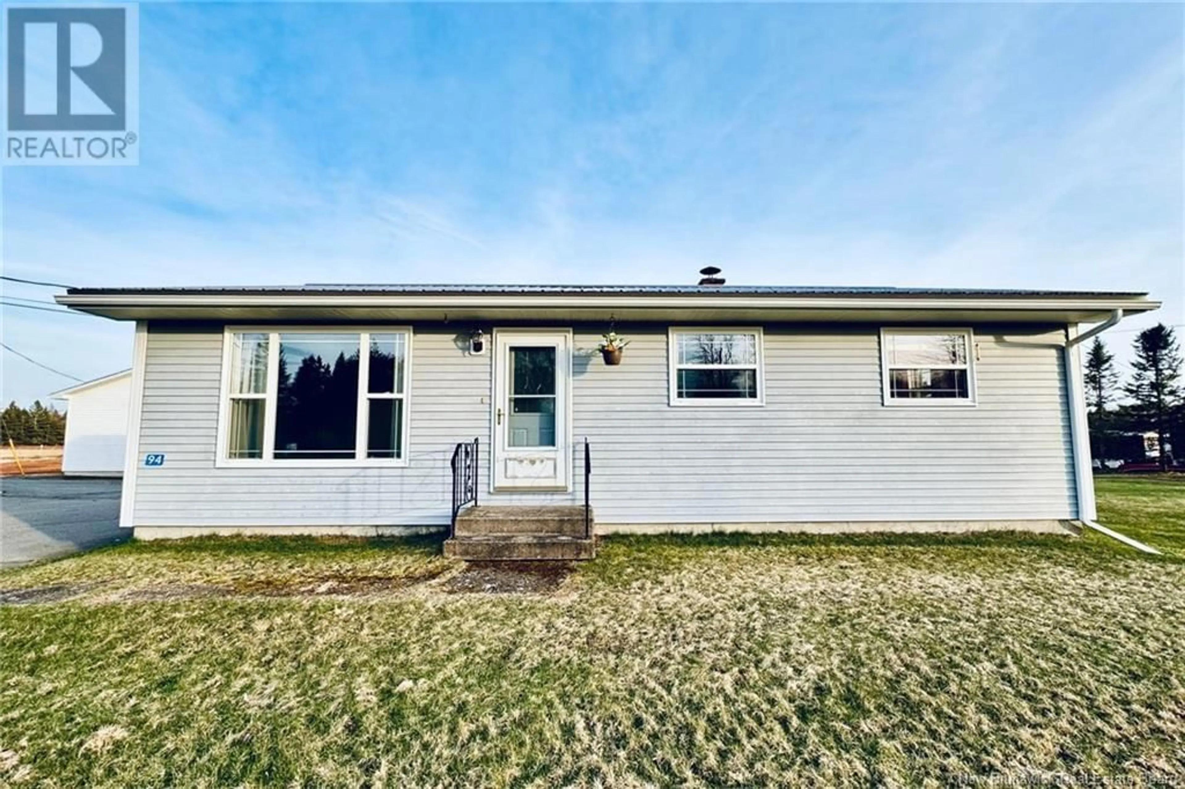 Home with vinyl exterior material, street for 94 JACK ROAD, Pennfield New Brunswick E5H1W8