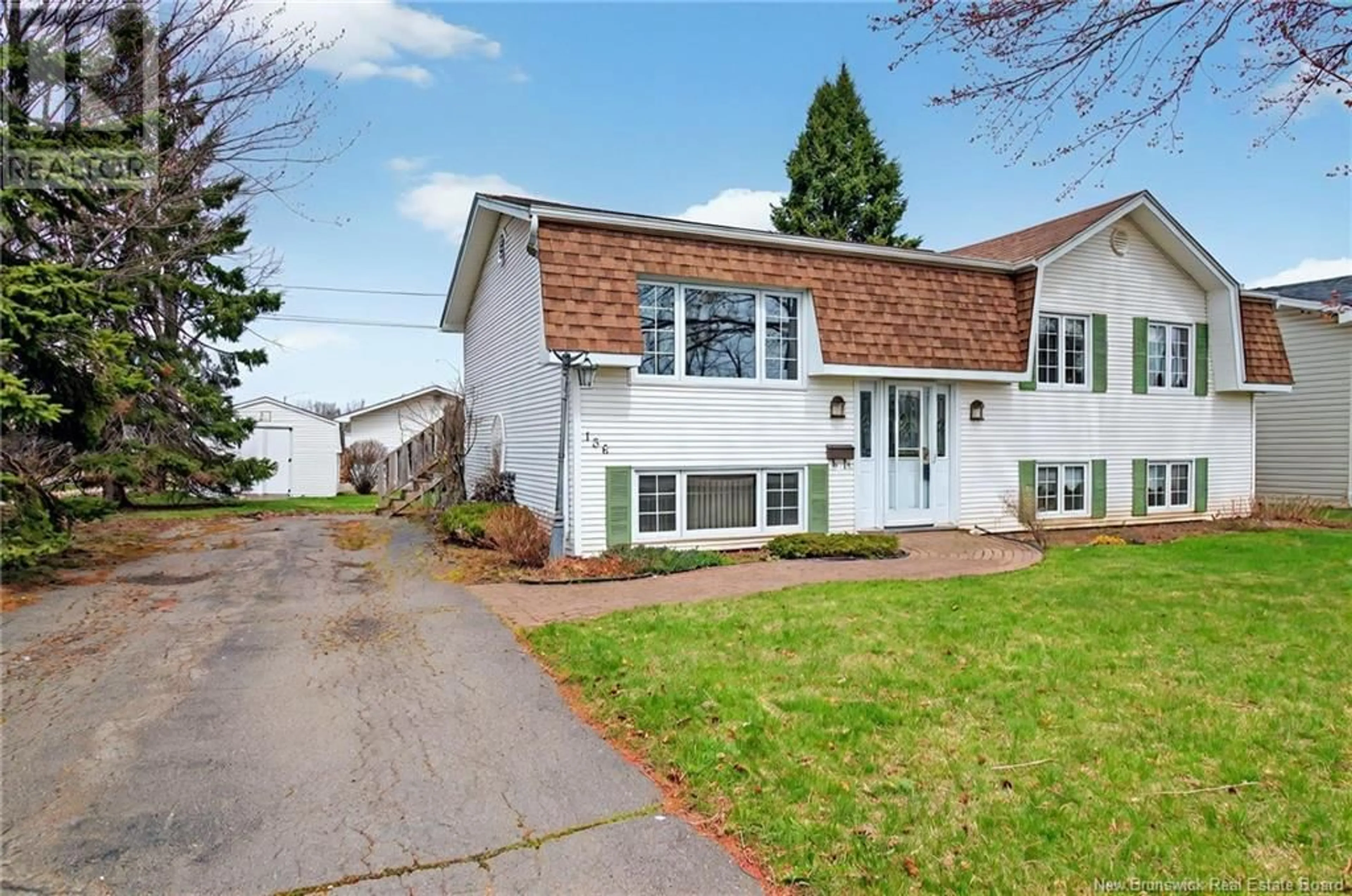 Home with vinyl exterior material, street for 136 MECCA DRIVE, Moncton New Brunswick E1G1B9