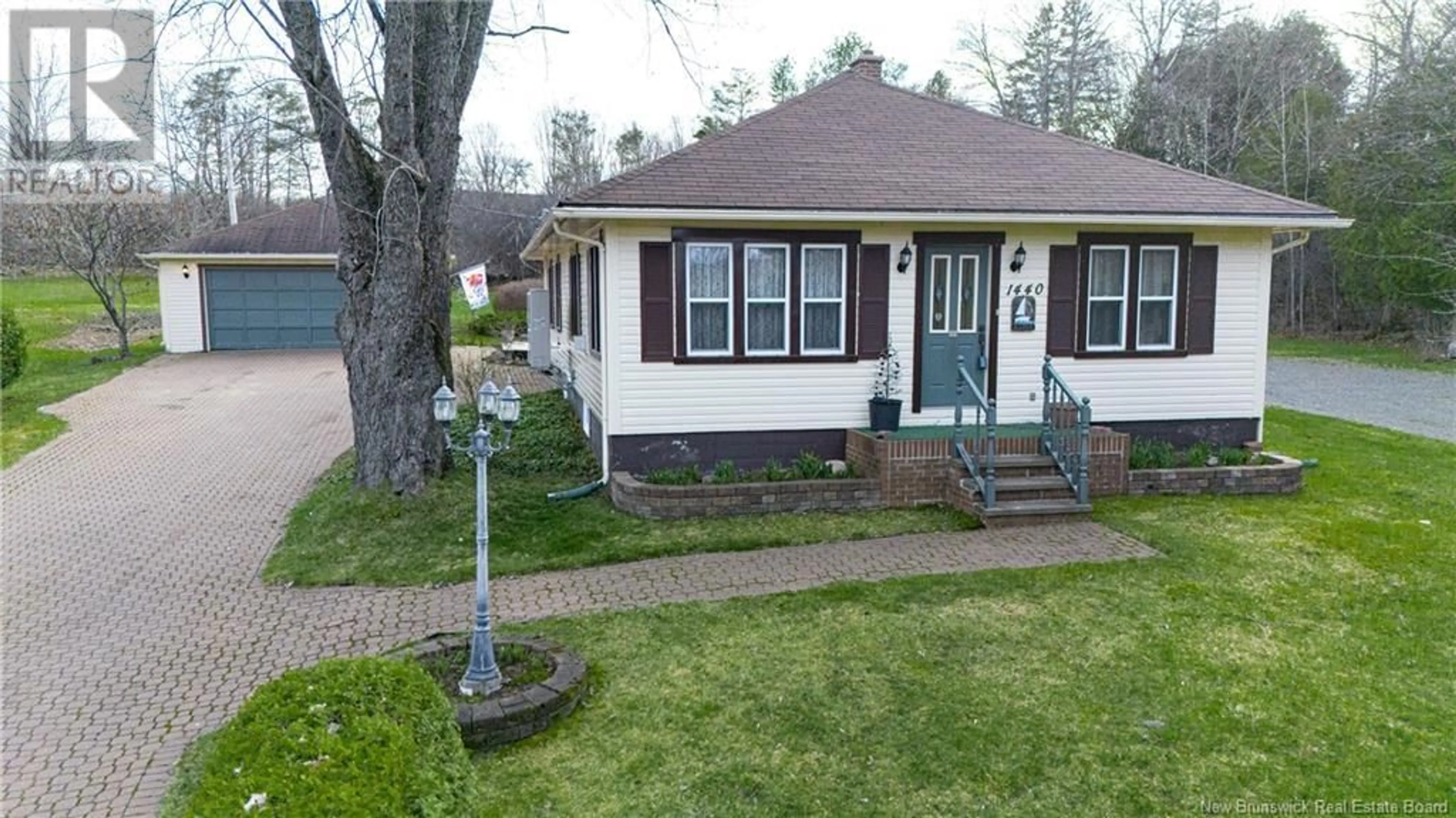 A pic from outside/outdoor area/front of a property/back of a property/a pic from drone, street for 1440 LINCOLN ROAD, Lincoln New Brunswick E3B8J4