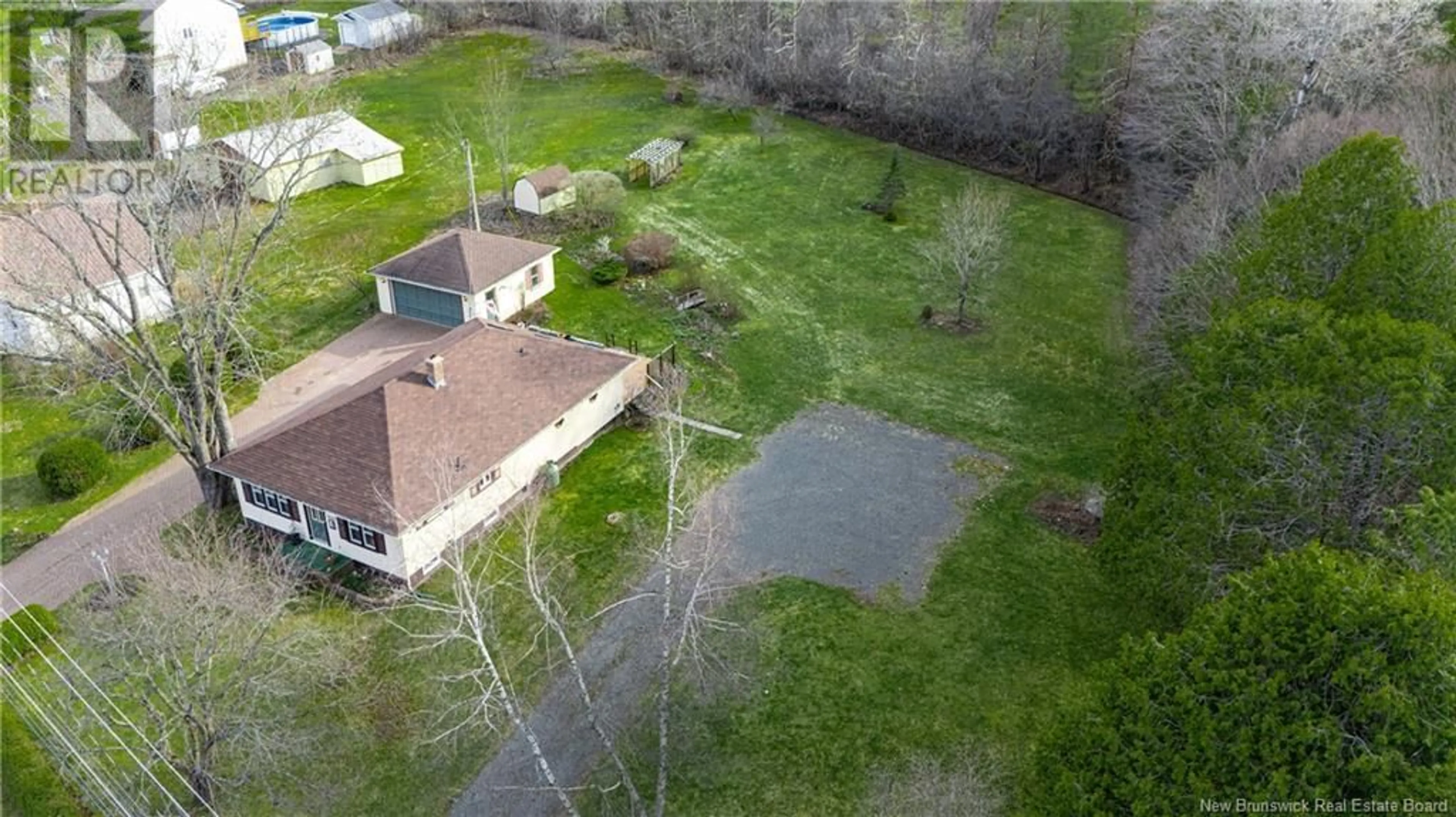 A pic from outside/outdoor area/front of a property/back of a property/a pic from drone, unknown for 1440 LINCOLN ROAD, Lincoln New Brunswick E3B8J4