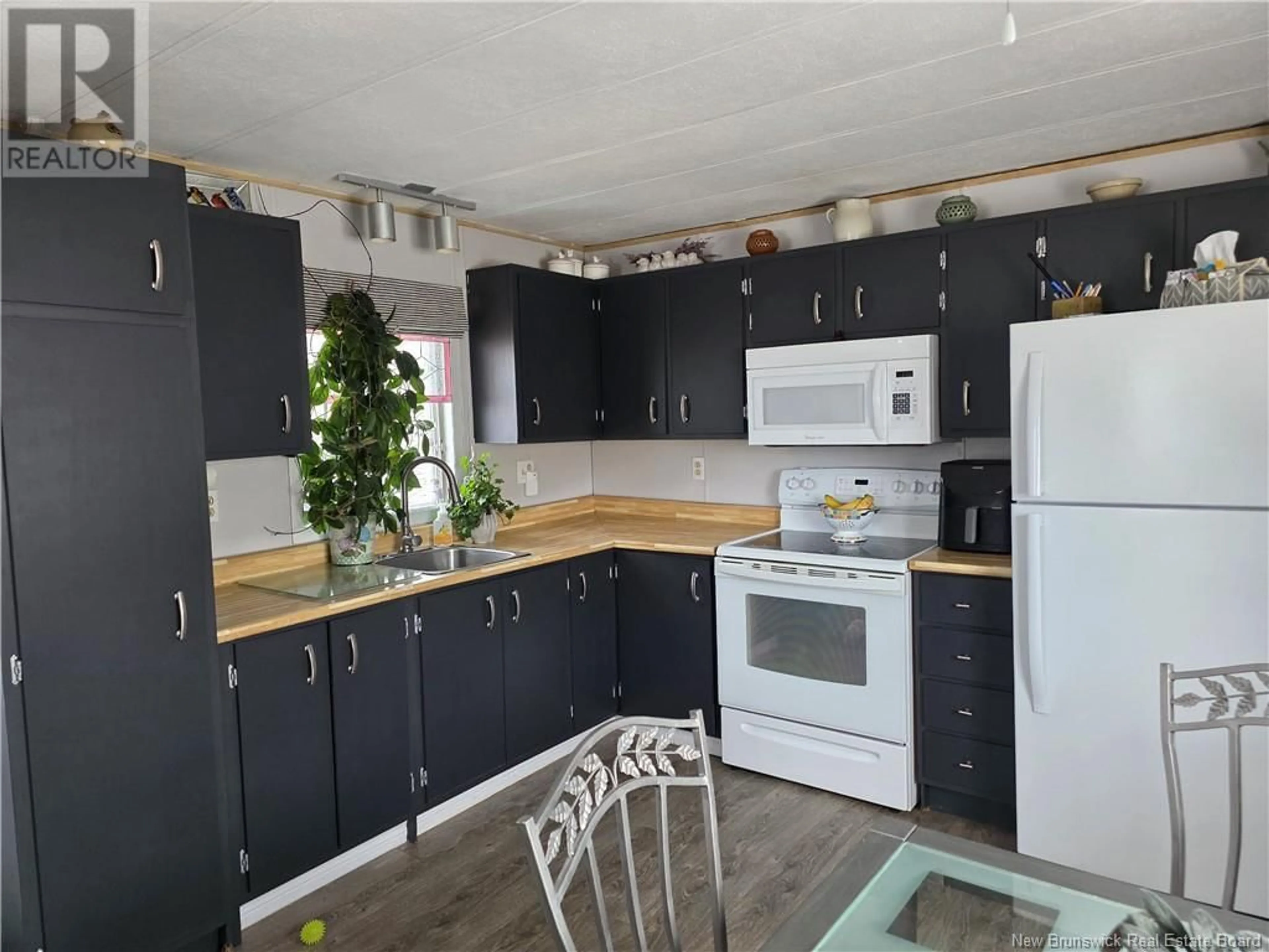 Standard kitchen, wood/laminate floor for 2 MACINTOSH STREET, Fredericton New Brunswick E3C1L8