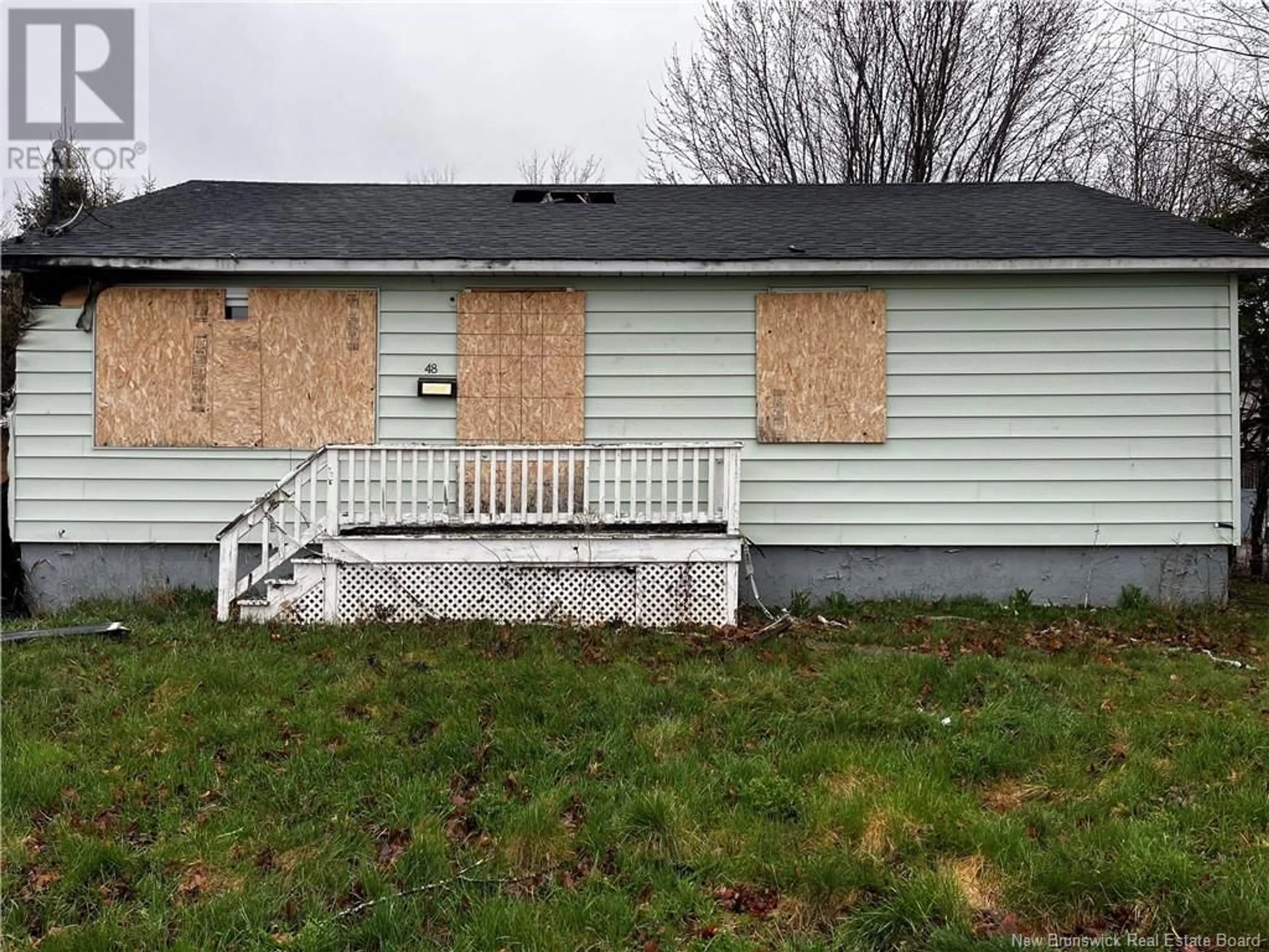 Home with vinyl exterior material, street for 48 EDMOND STREET, Moncton New Brunswick E1A3K6