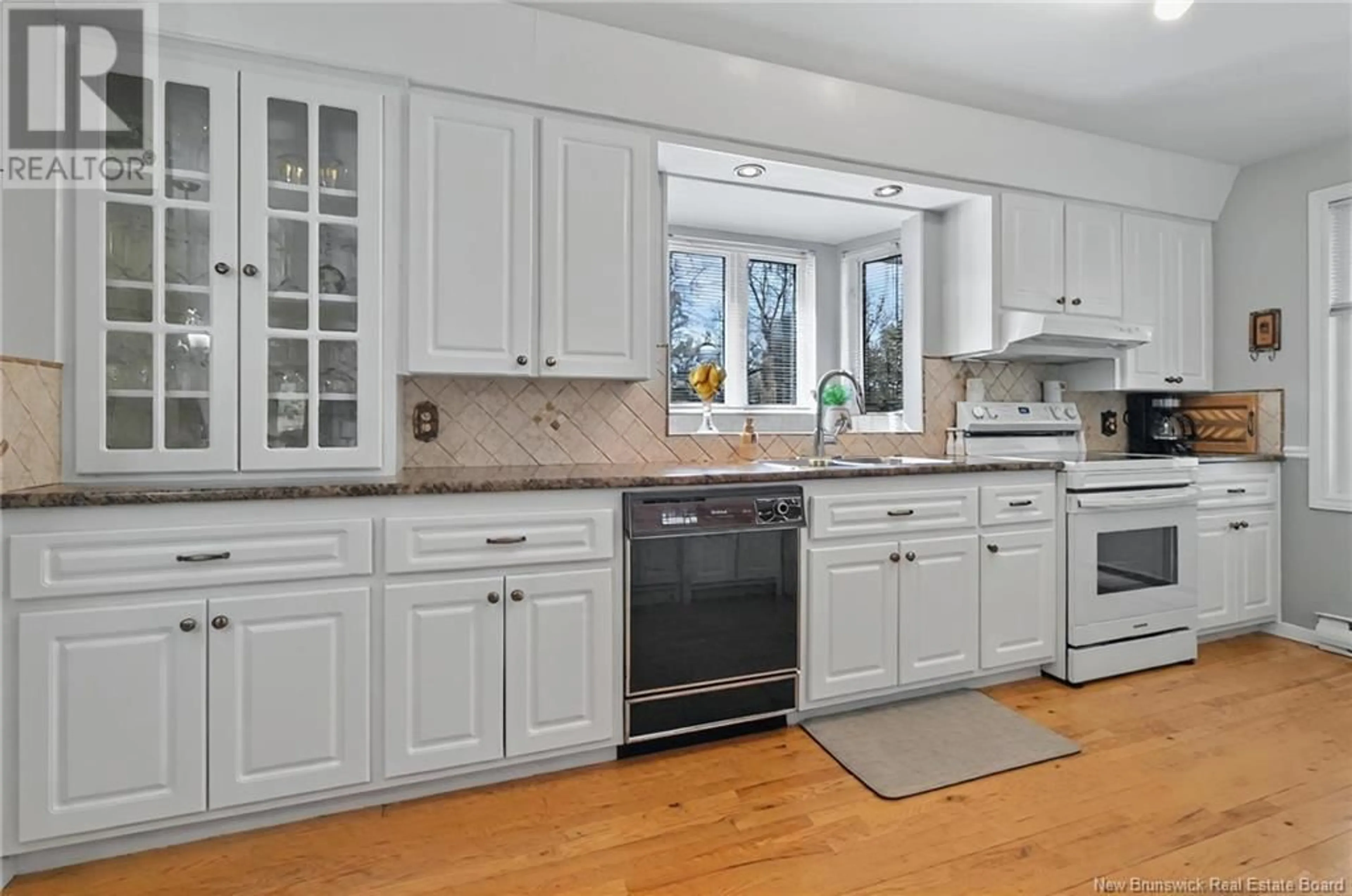 Open concept kitchen, ceramic/tile floor for 39 RENAUD ROAD, Saint-Antoine New Brunswick E4V1M9