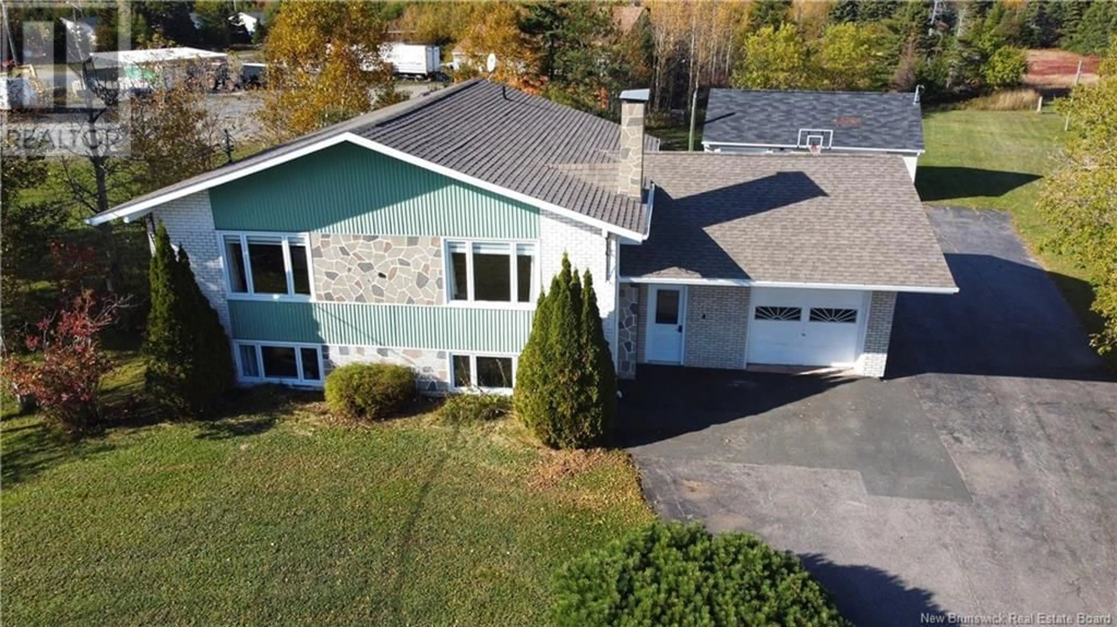 A pic from outside/outdoor area/front of a property/back of a property/a pic from drone, unknown for 92 DU PÊCHEUR, Lamèque New Brunswick E8T1J6