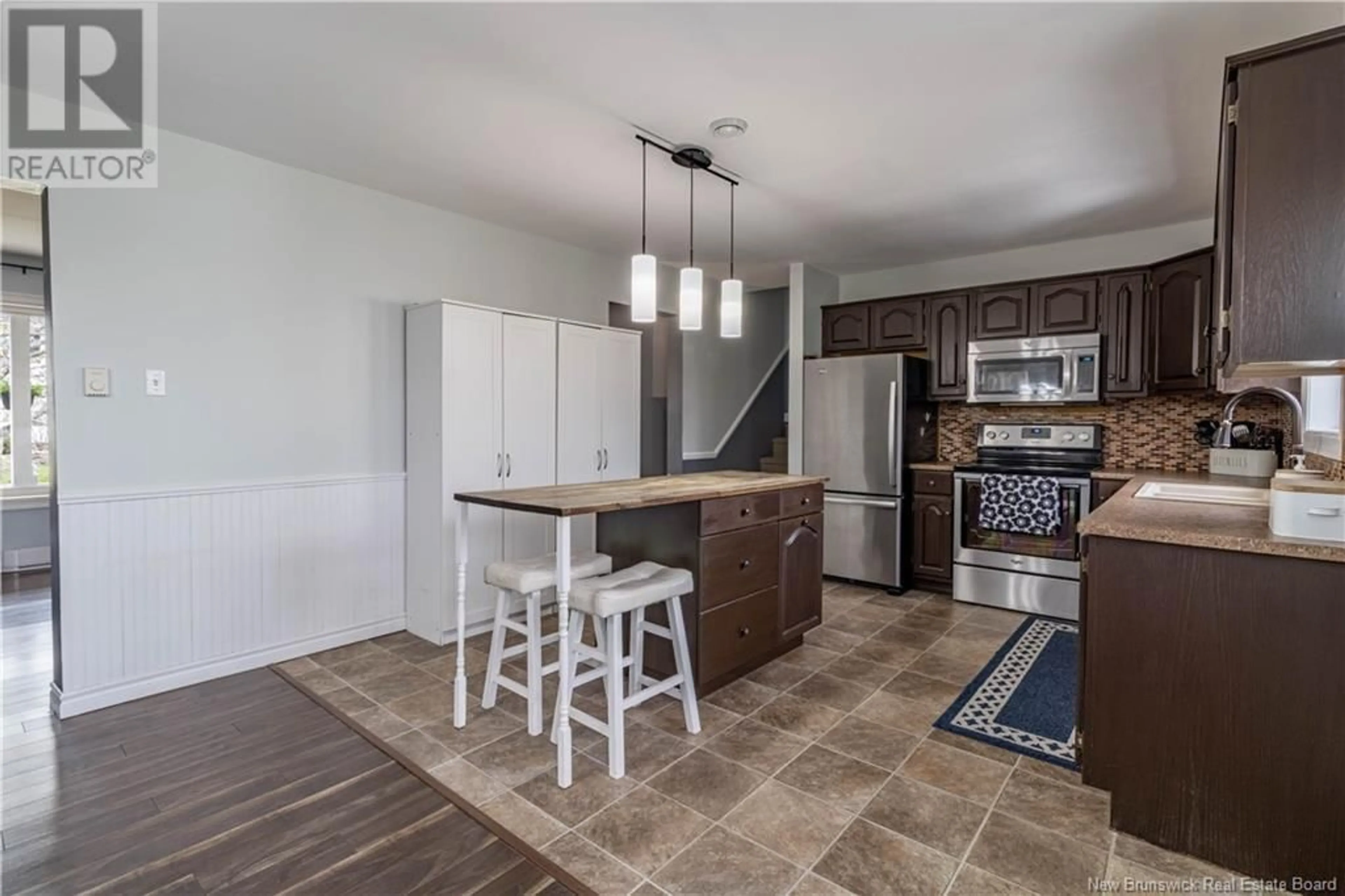 Open concept kitchen, ceramic/tile floor for 13 AMBERWOOD COURT, Moncton New Brunswick E1C9H1