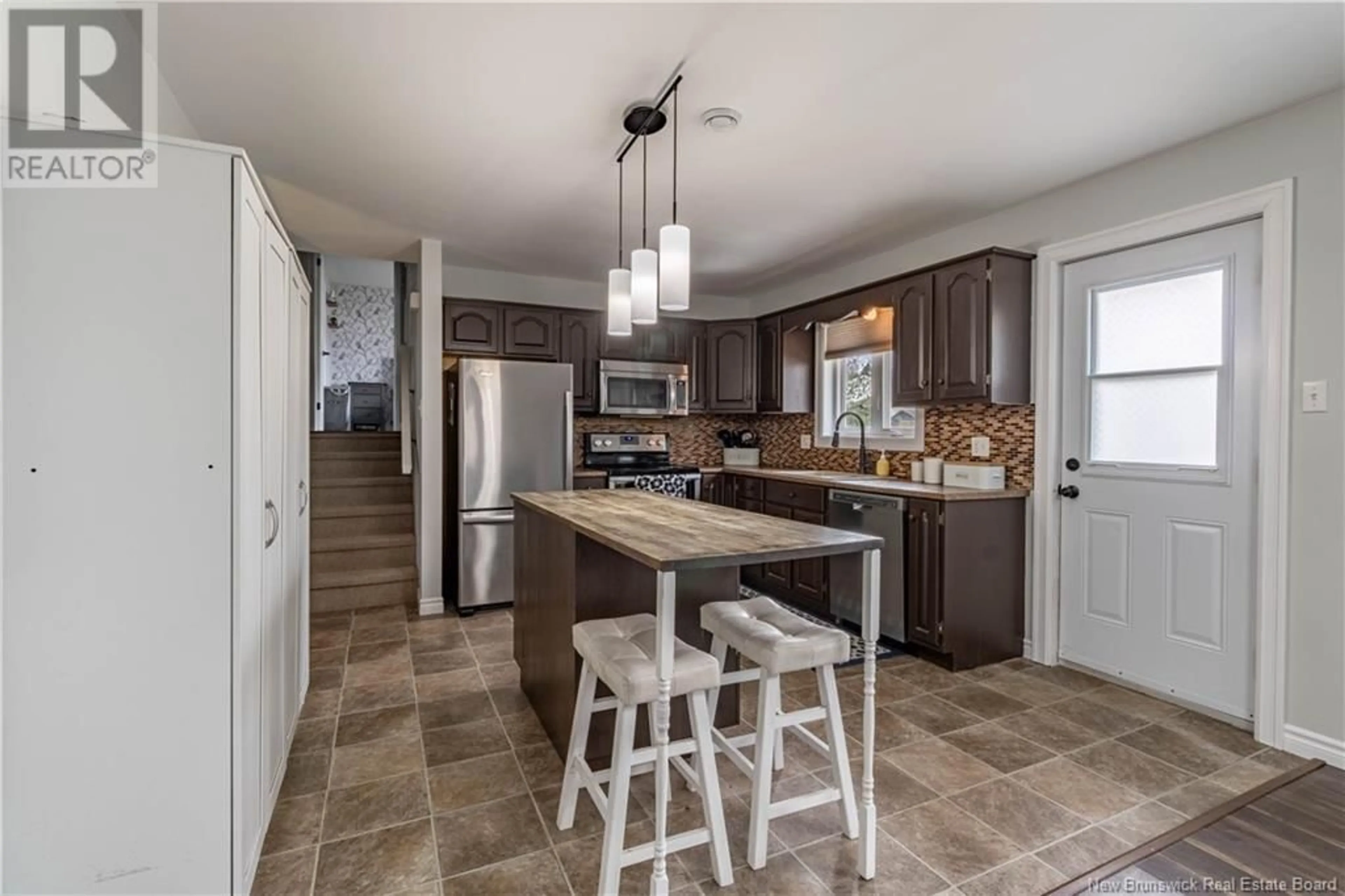 Open concept kitchen, ceramic/tile floor for 13 AMBERWOOD COURT, Moncton New Brunswick E1C9H1