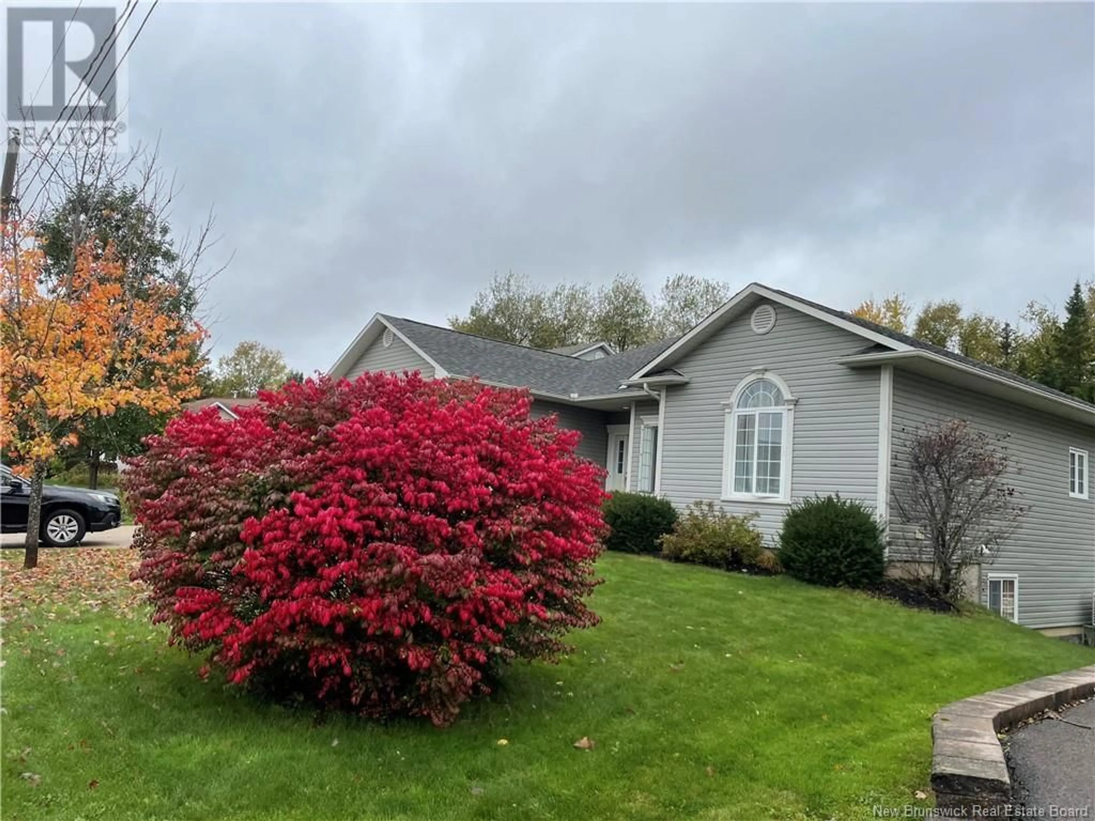 A pic from outside/outdoor area/front of a property/back of a property/a pic from drone, unknown for 74 HARLAND COURT, Fredericton New Brunswick E3B0E3