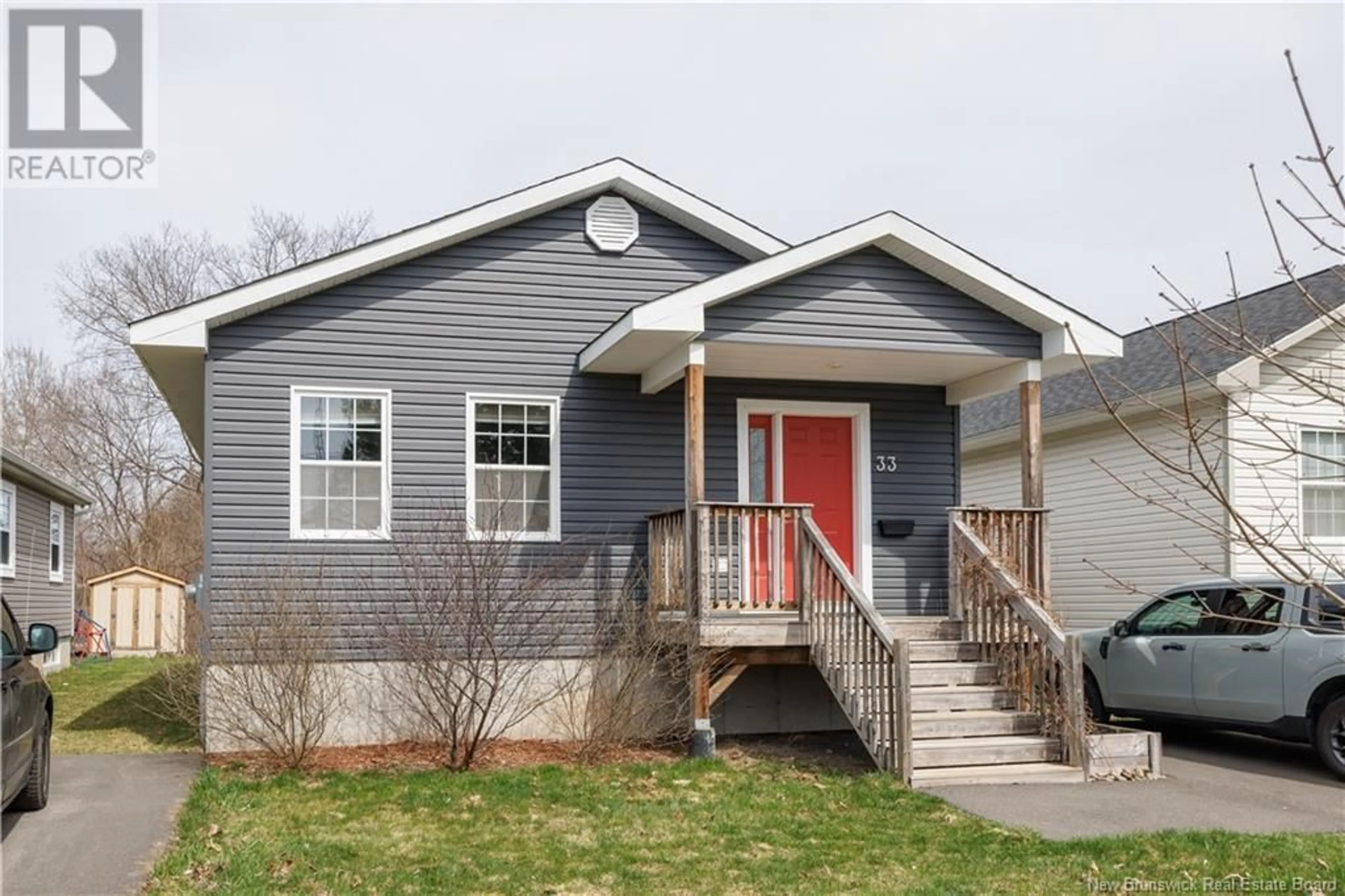 Home with vinyl exterior material, street for 33 EATMAN AVENUE, Fredericton New Brunswick E3A3V7