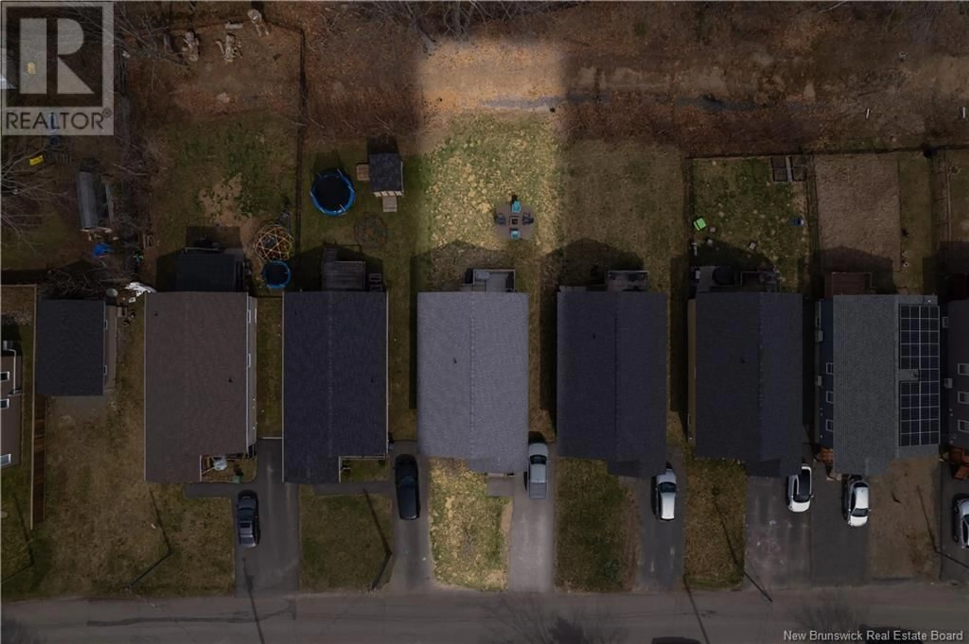 A pic from outside/outdoor area/front of a property/back of a property/a pic from drone, street for 33 EATMAN AVENUE, Fredericton New Brunswick E3A3V7
