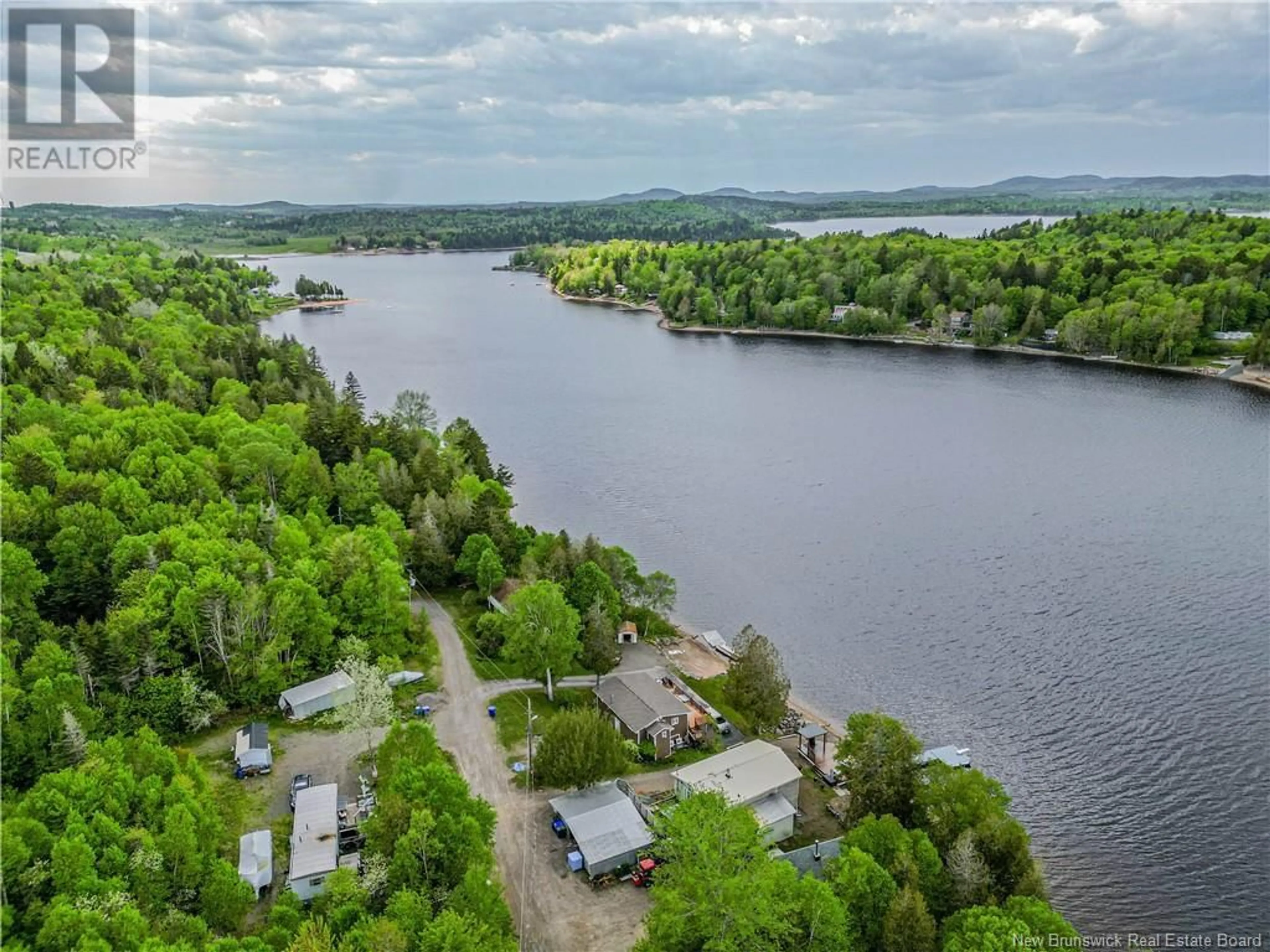 A pic from outside/outdoor area/front of a property/back of a property/a pic from drone, water/lake/river/ocean view for 72 MAINLINE ROAD, Utopia New Brunswick E5C2G9