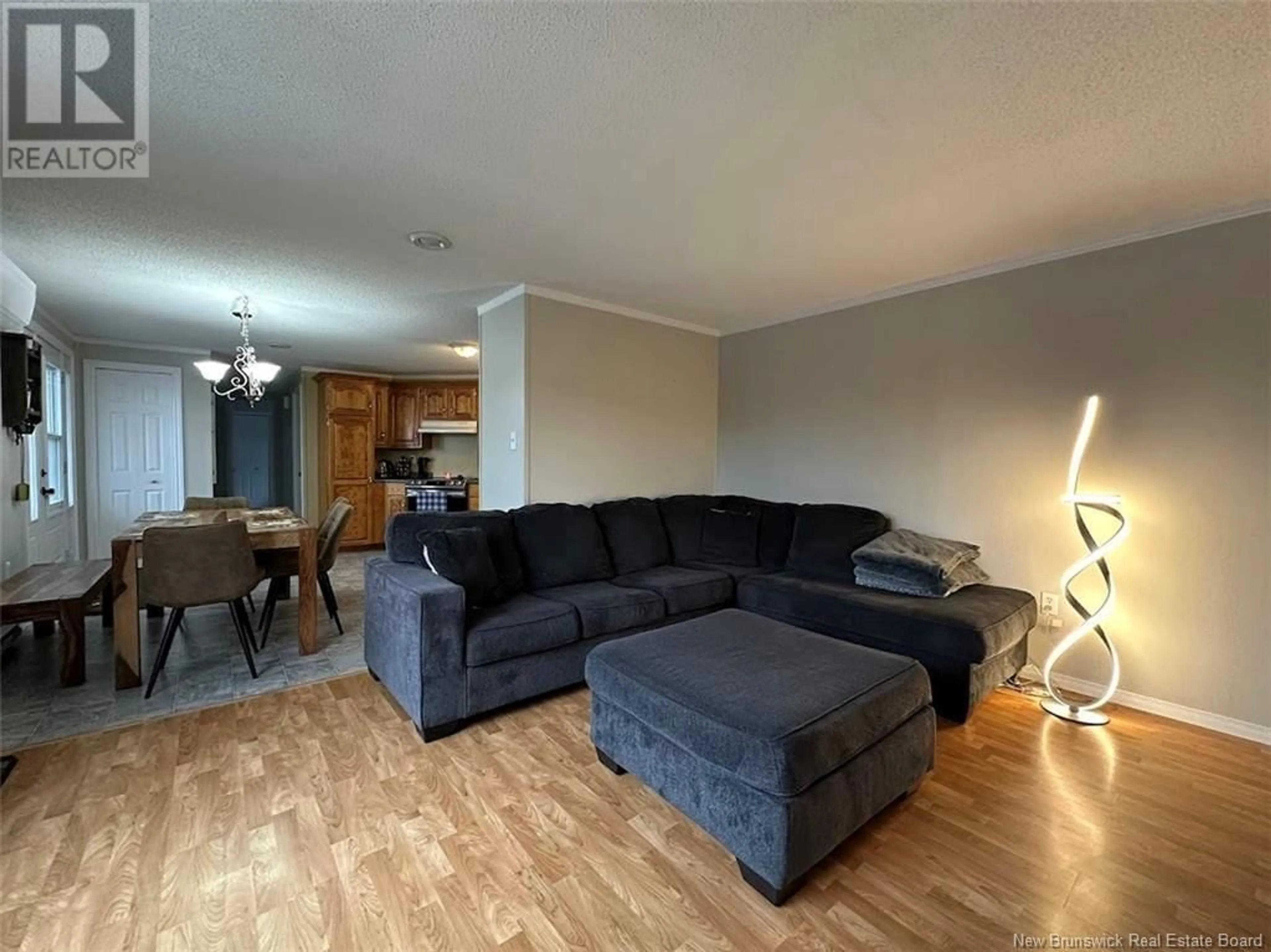 Living room with furniture, wood/laminate floor for 60 CARDINAL STREET, Edmundston New Brunswick E3V5E4
