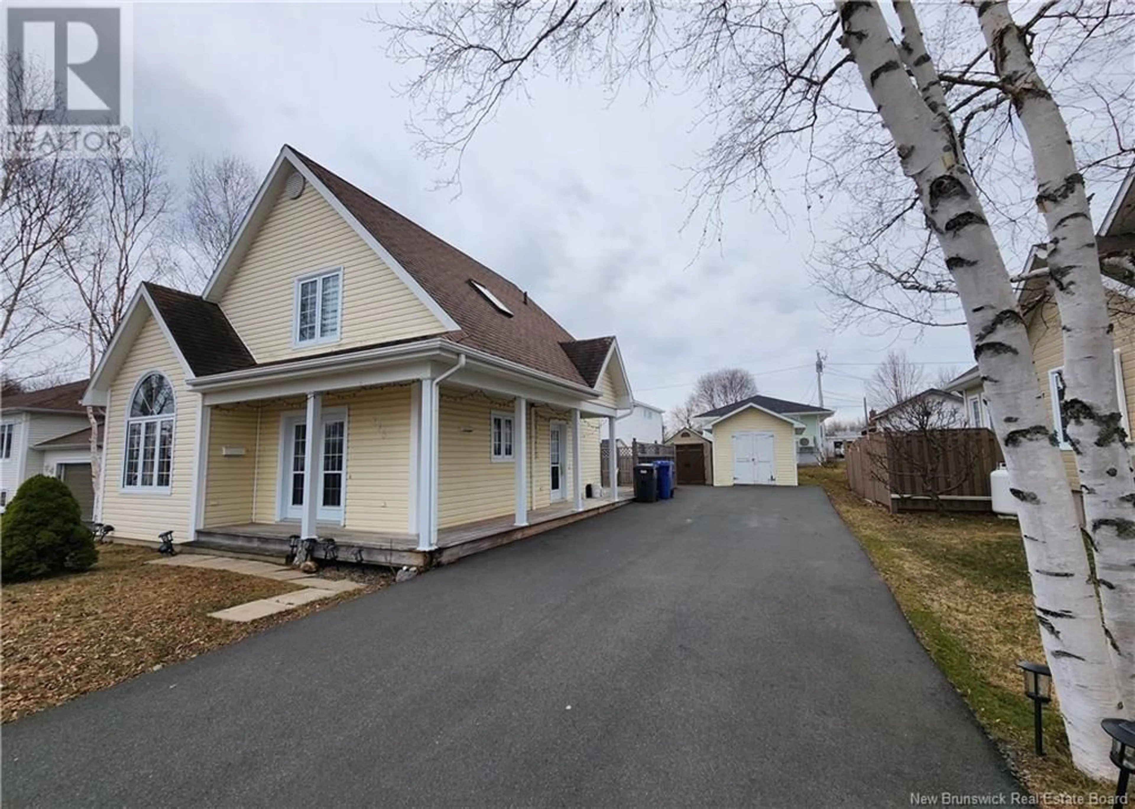 A pic from outside/outdoor area/front of a property/back of a property/a pic from drone, street for 875 ROUSSY, Bathurst New Brunswick E2A4W5