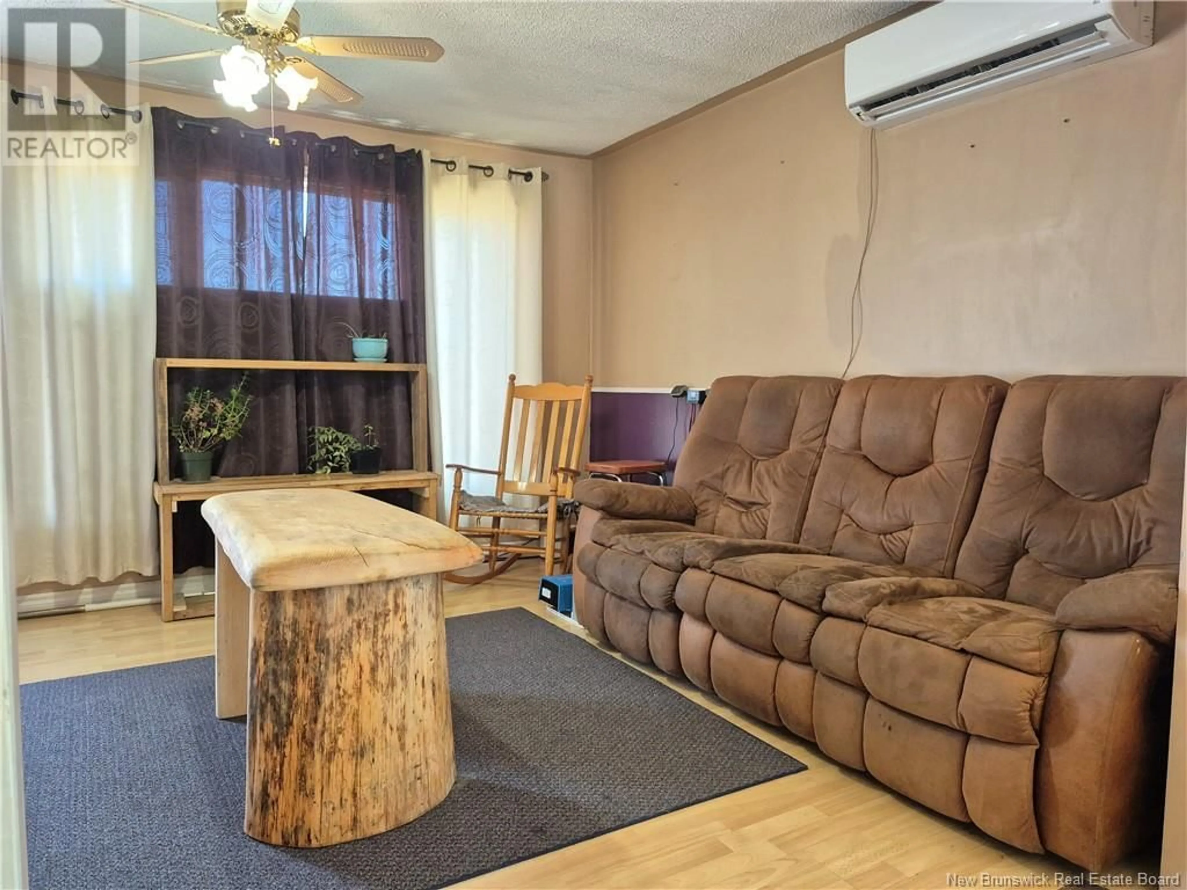 Living room with furniture, wood/laminate floor for 1871 RTE 160, Saint-Sauveur New Brunswick E8L1N5