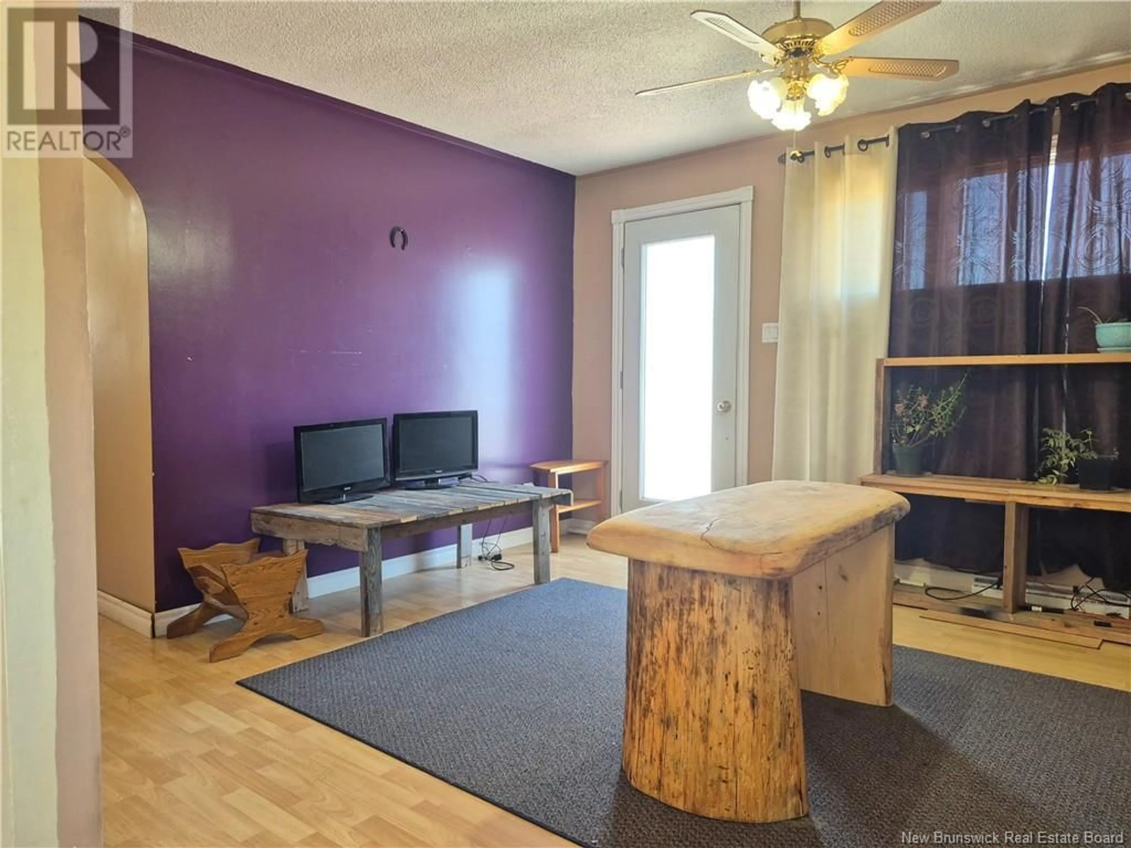 Living room with furniture, wood/laminate floor for 1871 RTE 160, Saint-Sauveur New Brunswick E8L1N5