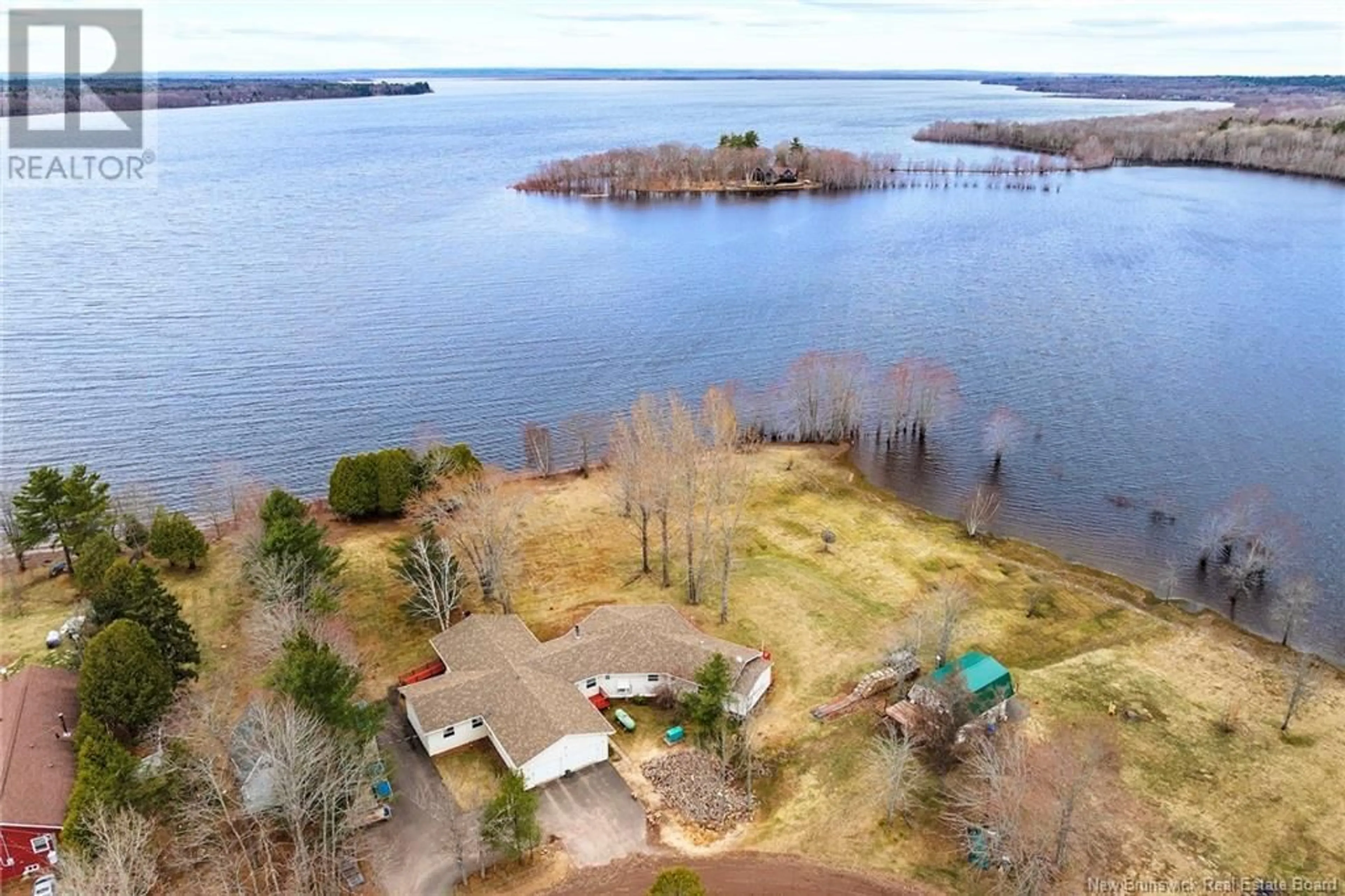 A pic from outside/outdoor area/front of a property/back of a property/a pic from drone, water/lake/river/ocean view for 38 SHORE ROAD, Clarks Corner New Brunswick E4B1R7