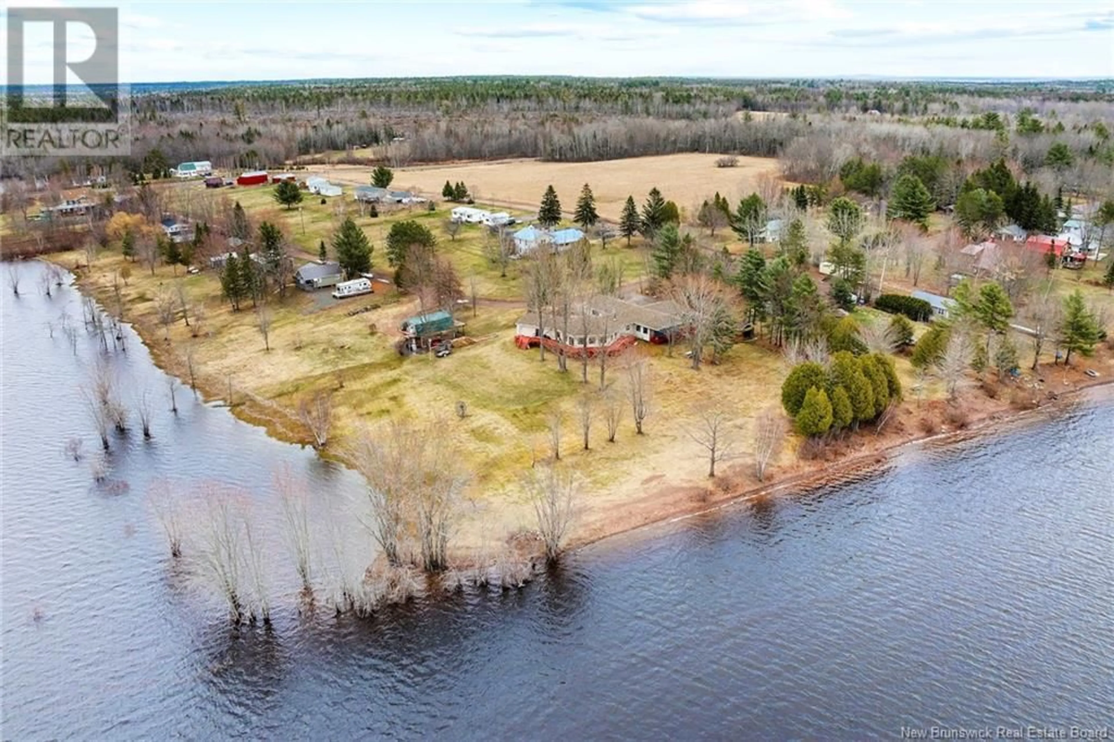 A pic from outside/outdoor area/front of a property/back of a property/a pic from drone, water/lake/river/ocean view for 38 SHORE ROAD, Clarks Corner New Brunswick E4B1R7