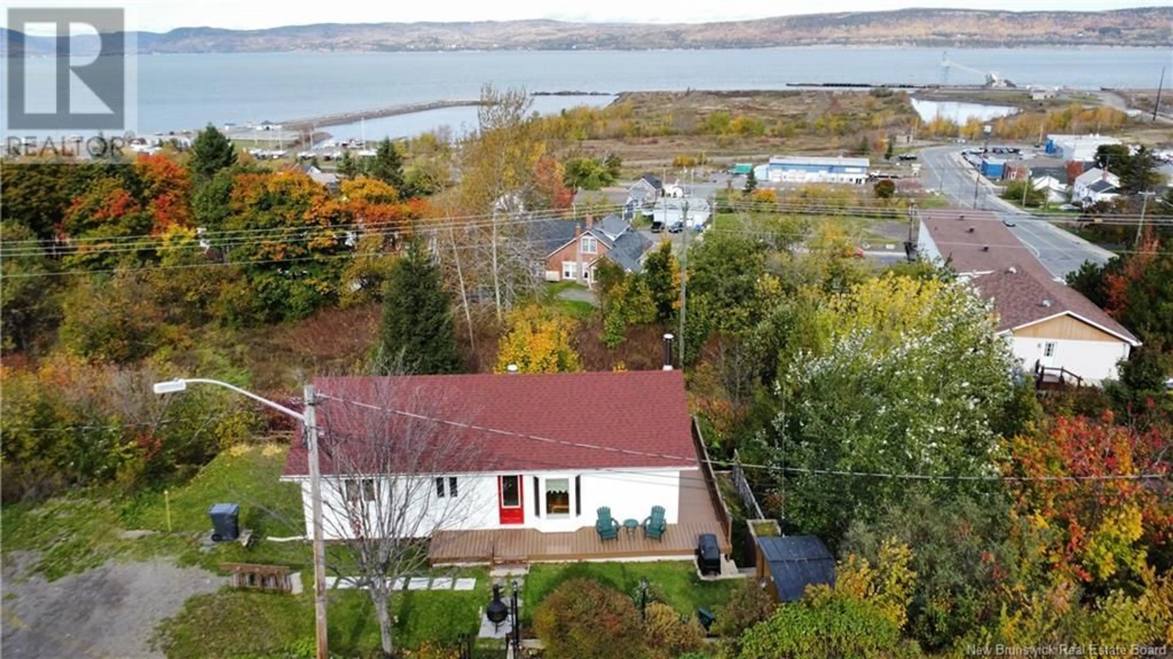 A pic from outside/outdoor area/front of a property/back of a property/a pic from drone, water/lake/river/ocean view for 103 LAVIGNE LANE, Dalhousie New Brunswick E8C1Z1