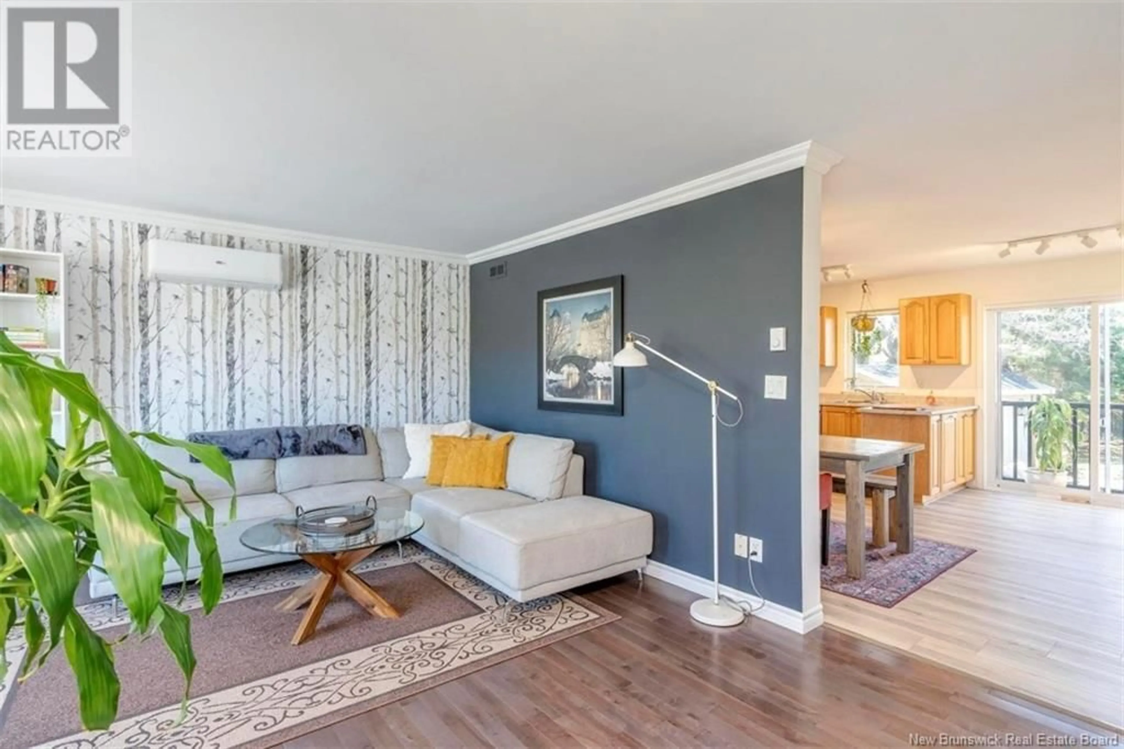 Living room with furniture, wood/laminate floor for 1019 SHEDIAC ROAD, Moncton New Brunswick E1A7B6