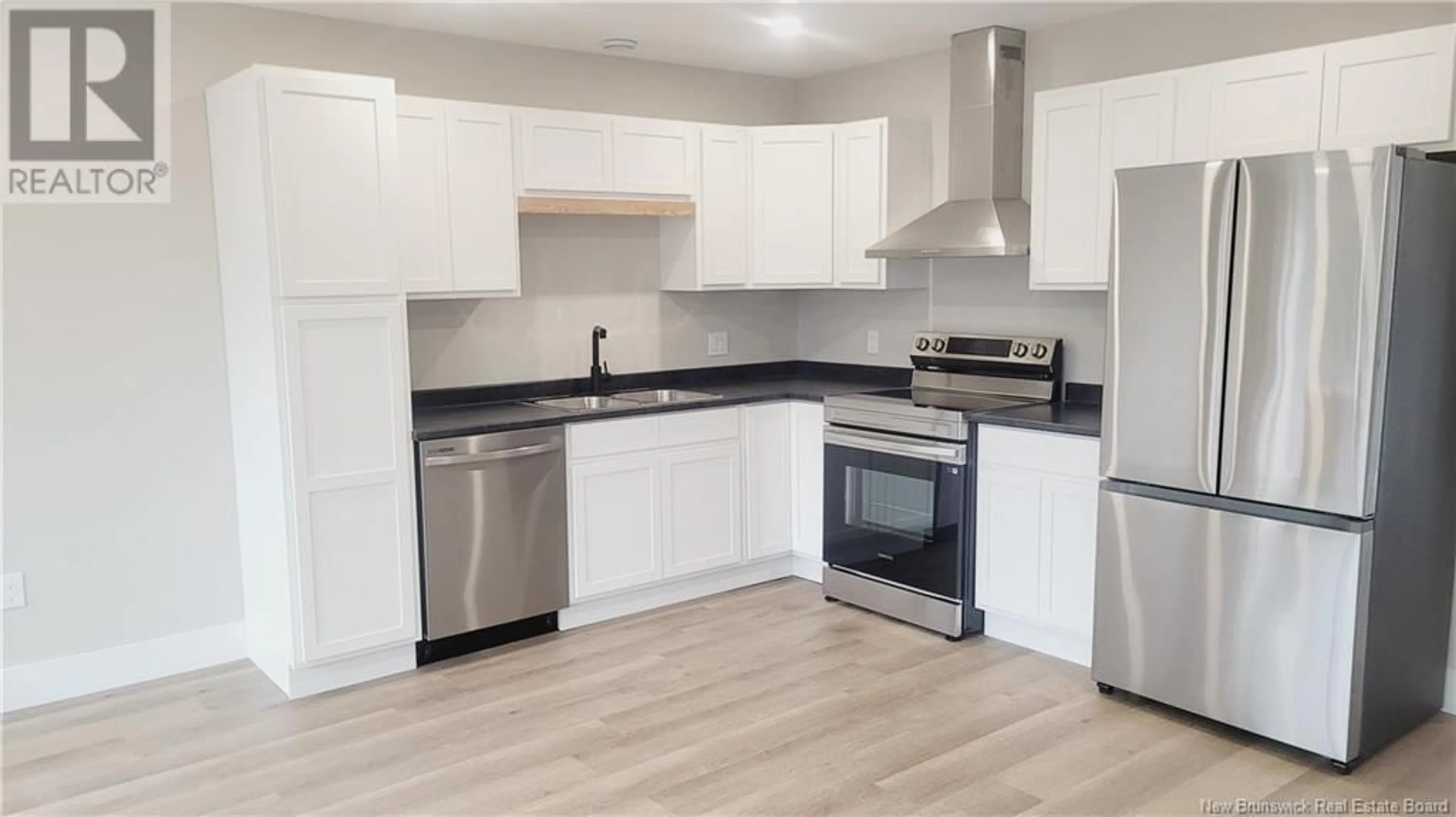 Open concept kitchen, wood/laminate floor for 142 ARLINGTON CRESCENT, Saint John New Brunswick E2K0G4