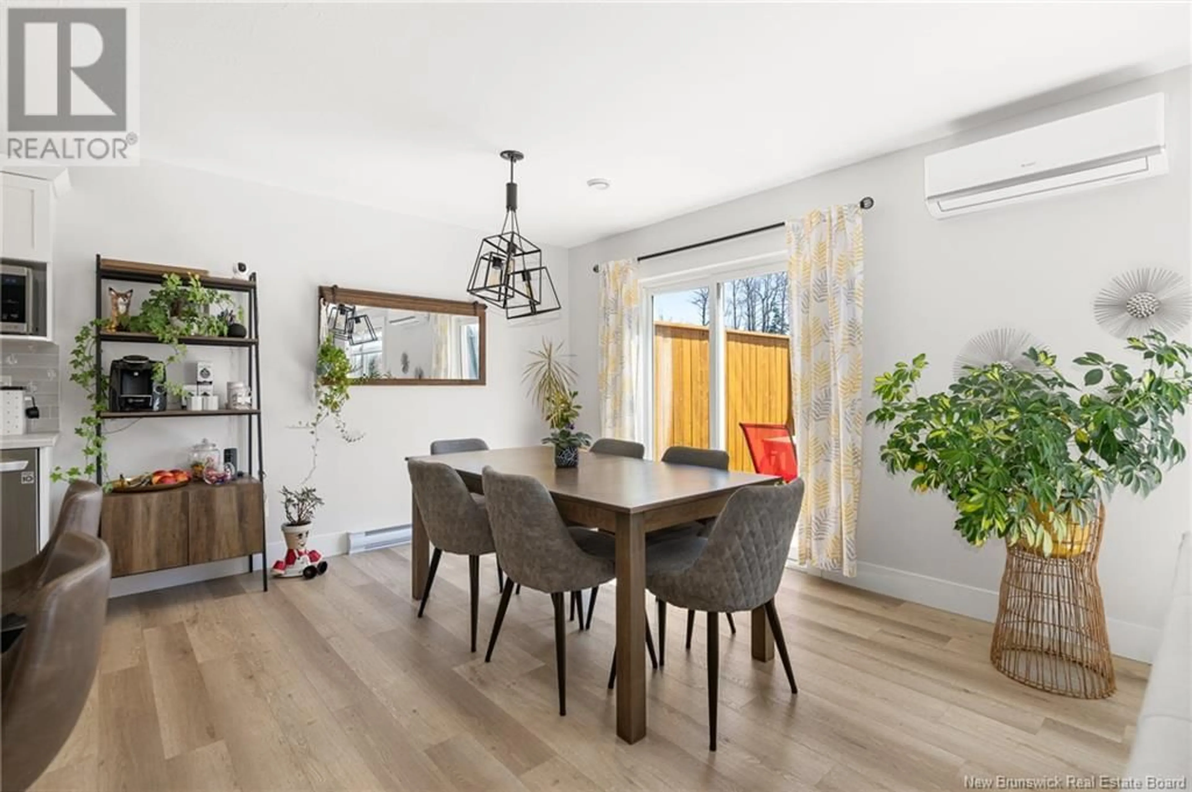 Dining room, wood/laminate floor for 163 MELANIE STREET, Dieppe New Brunswick E1A1N2