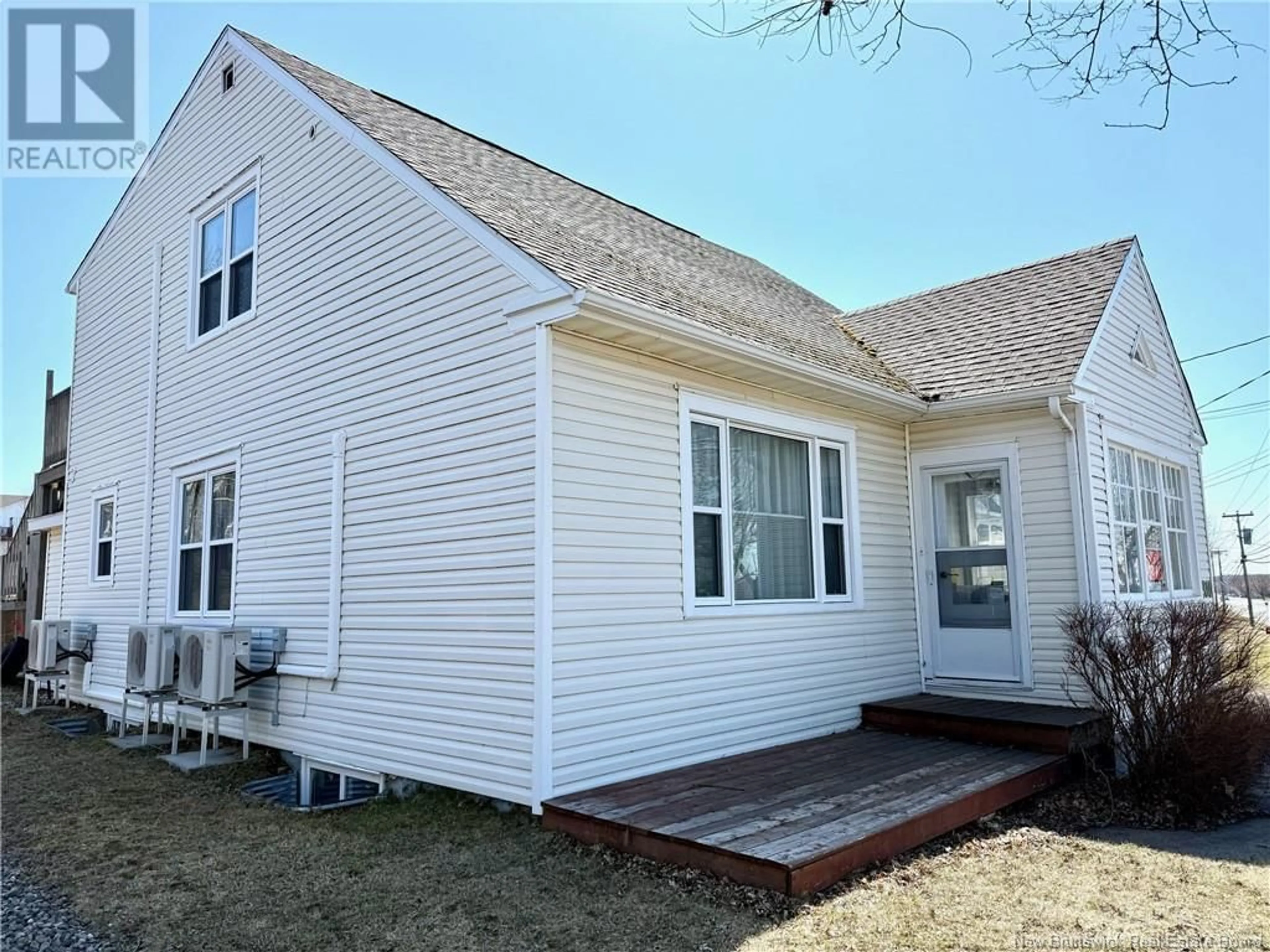 Home with vinyl exterior material, street for 310 BOUL. ST-PIERRE OUEST BOULEVARD, Caraquet New Brunswick E1W1A3
