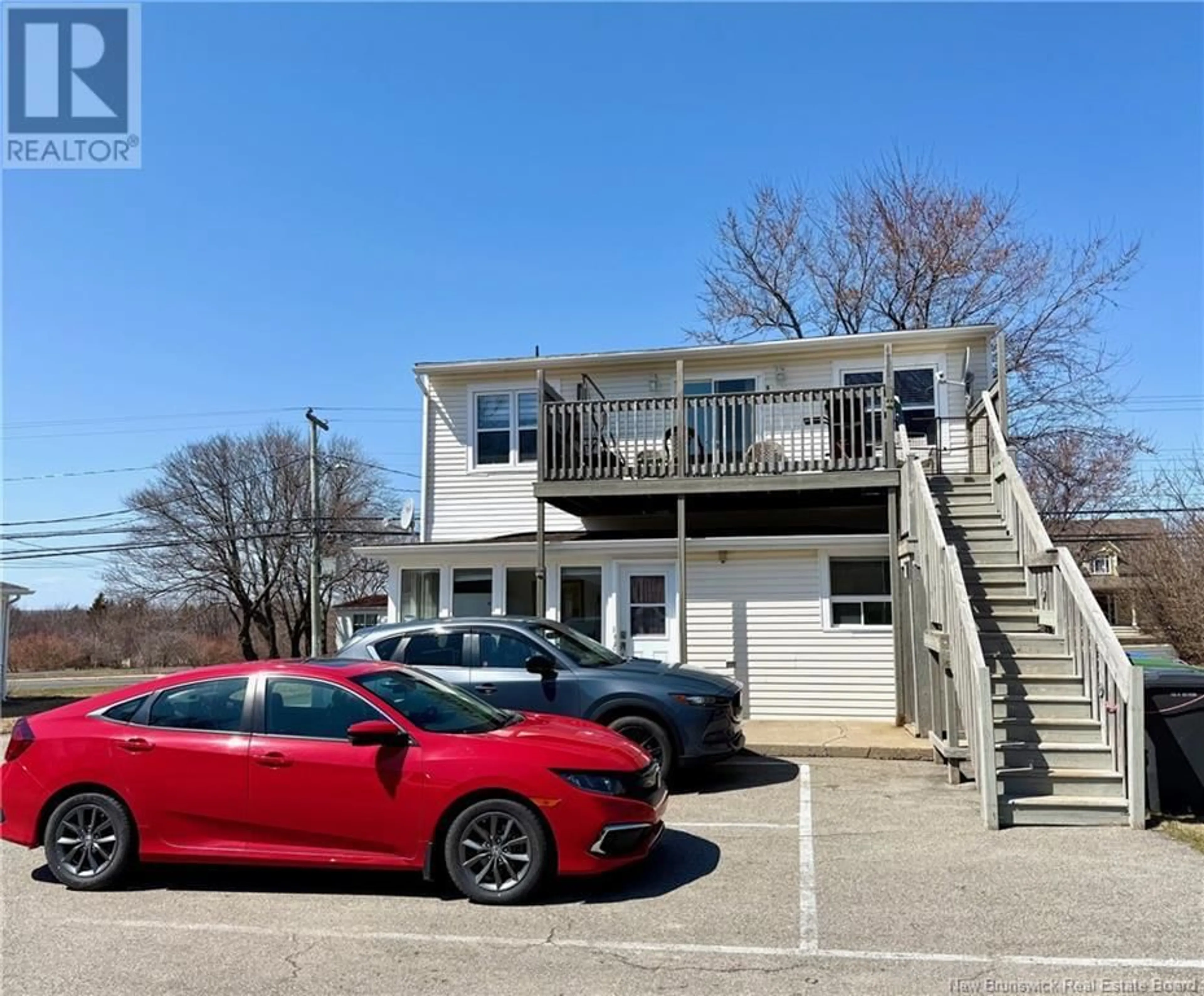 A pic from outside/outdoor area/front of a property/back of a property/a pic from drone, street for 310 BOUL. ST-PIERRE OUEST BOULEVARD, Caraquet New Brunswick E1W1A3