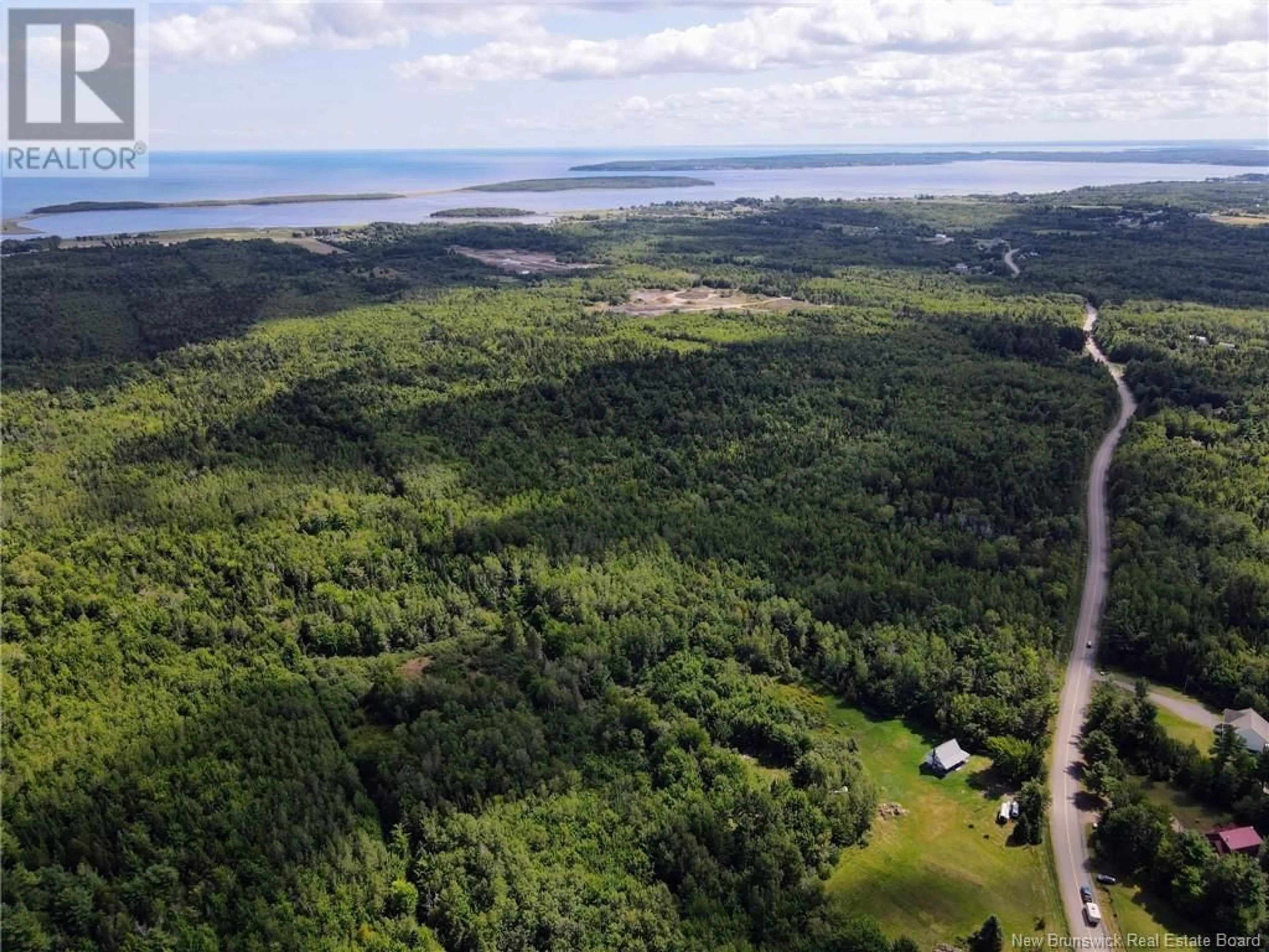 A pic from outside/outdoor area/front of a property/back of a property/a pic from drone, forest/trees view for 5431 ROUTE 134, Dundas New Brunswick E4R2Z1