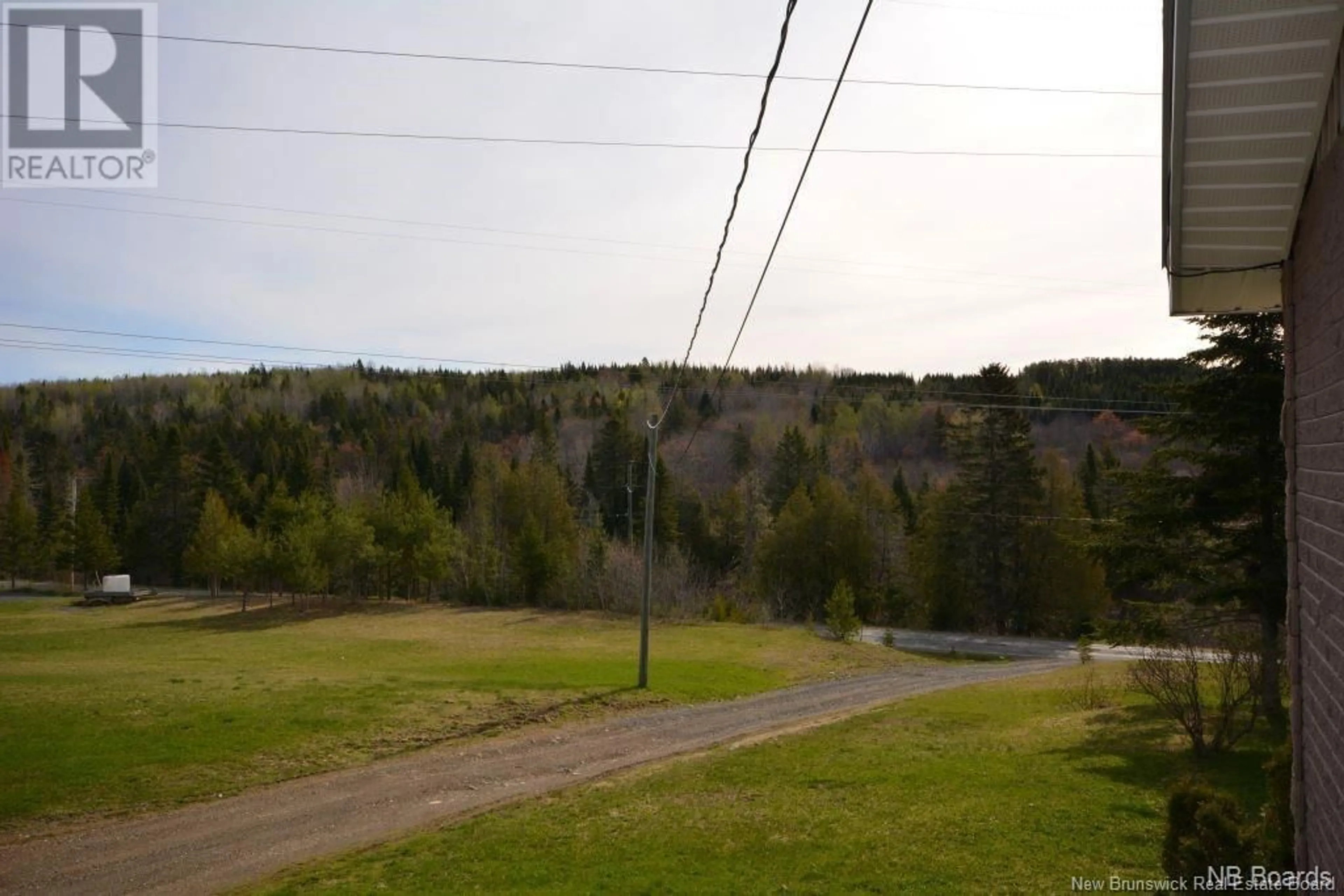 A pic from outside/outdoor area/front of a property/back of a property/a pic from drone, forest/trees view for 23 580 ROUTE, Windsor New Brunswick E7L4M3