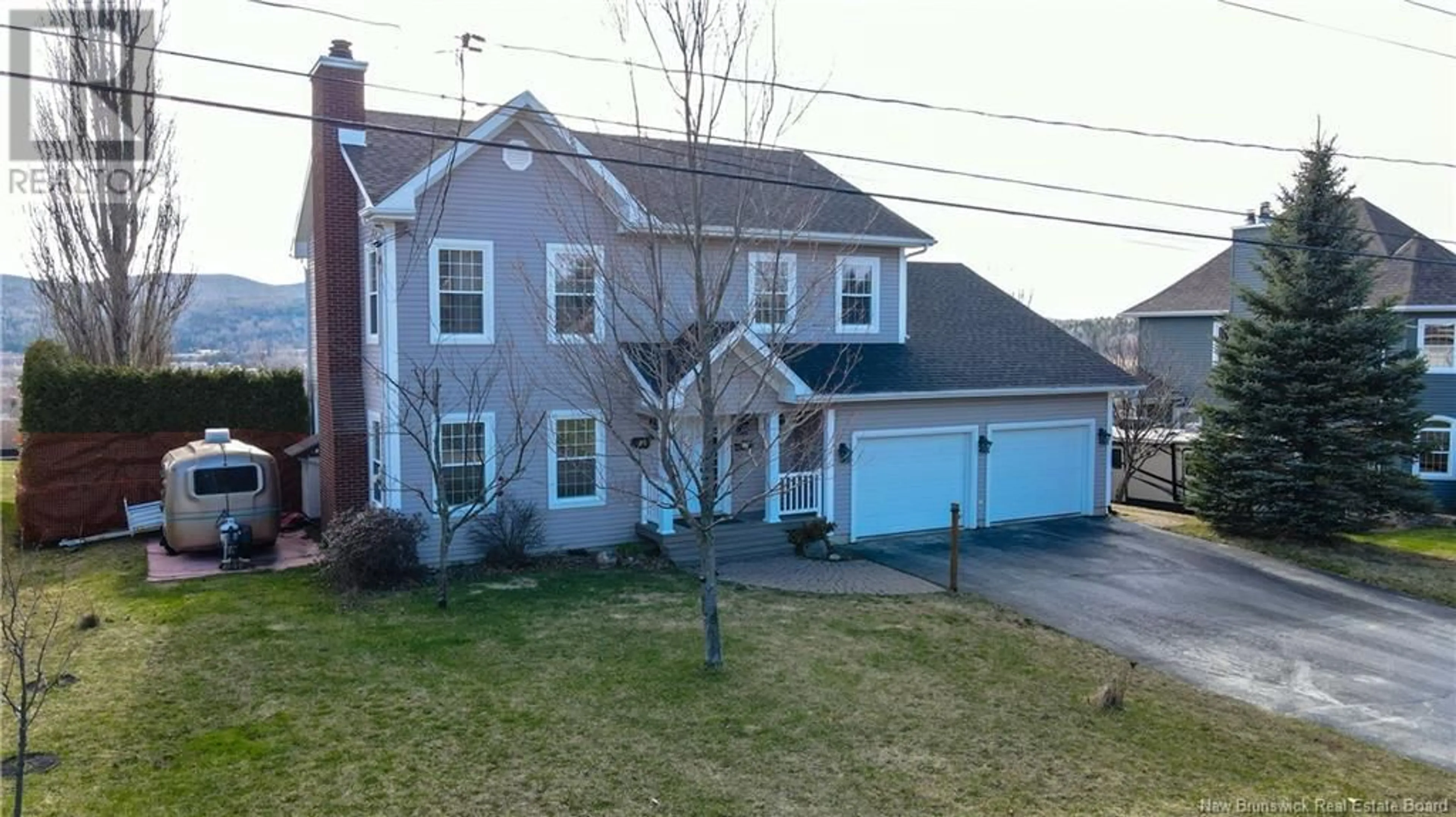 A pic from outside/outdoor area/front of a property/back of a property/a pic from drone, street for 105 DE LA CAPITALE BOULEVARD, Edmundston New Brunswick E3V5A2