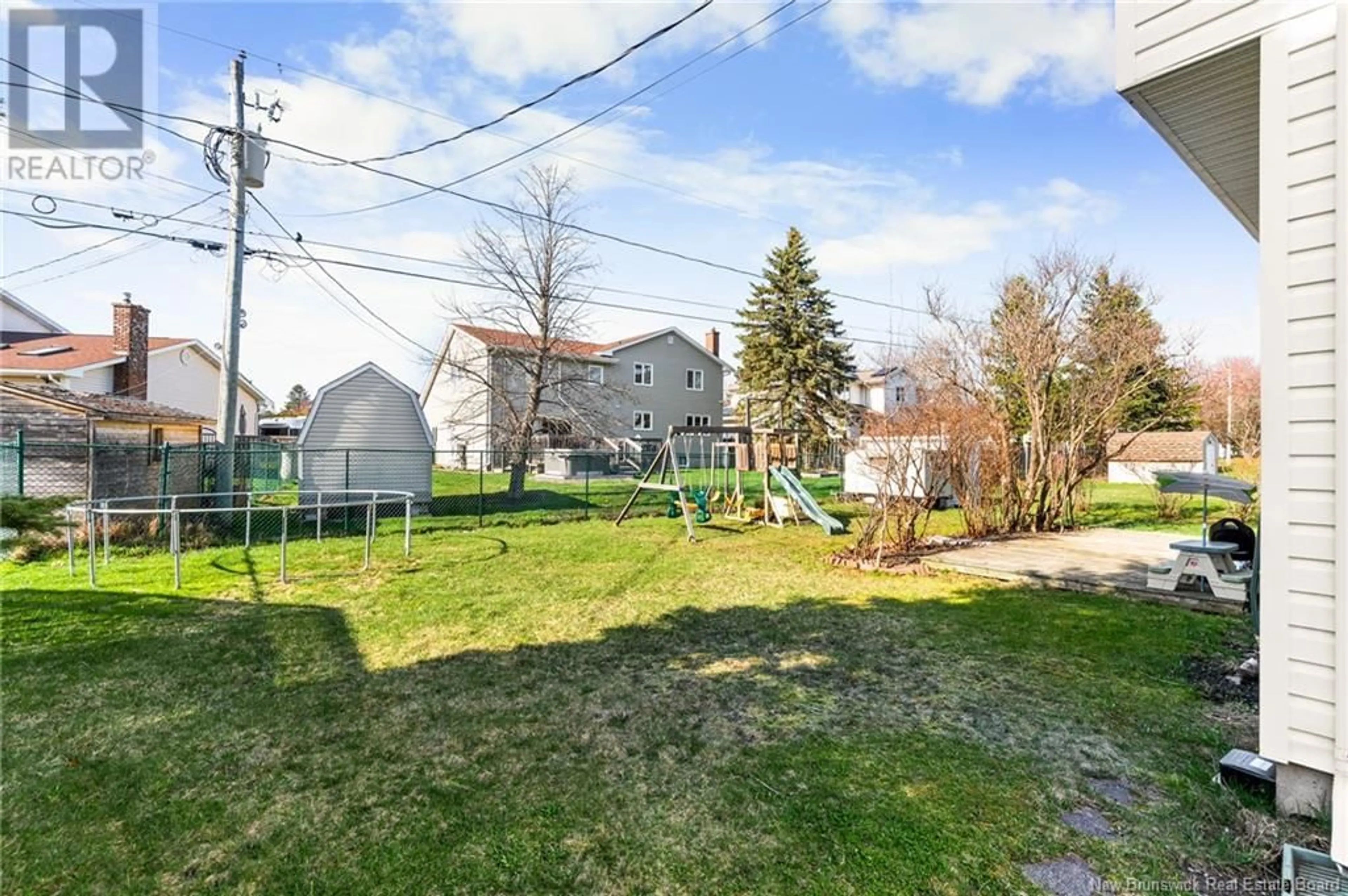 A pic from outside/outdoor area/front of a property/back of a property/a pic from drone, street for 84 CASTLE DRIVE, Moncton New Brunswick E1A6M1