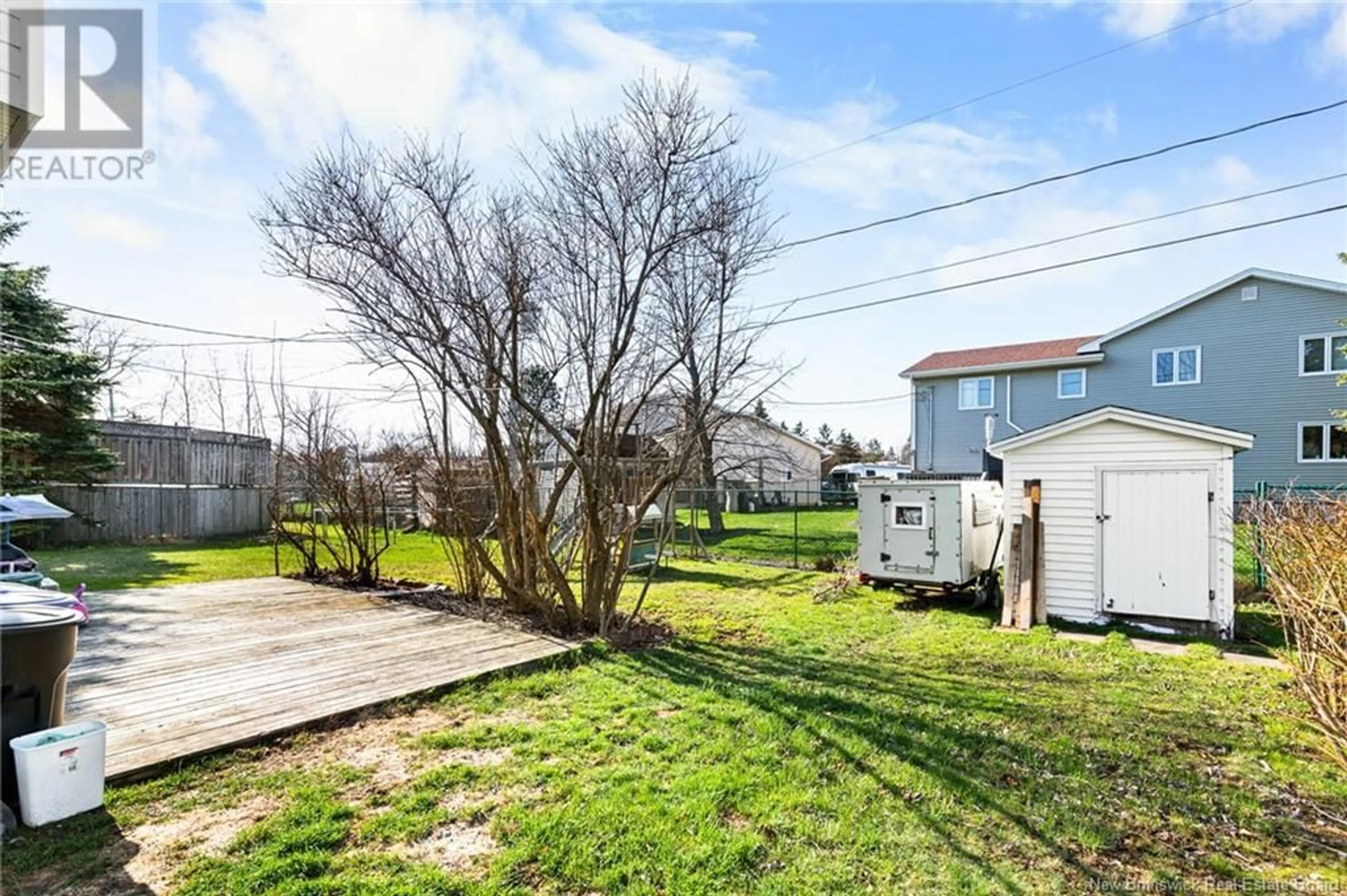 A pic from outside/outdoor area/front of a property/back of a property/a pic from drone, street for 84 CASTLE DRIVE, Moncton New Brunswick E1A6M1