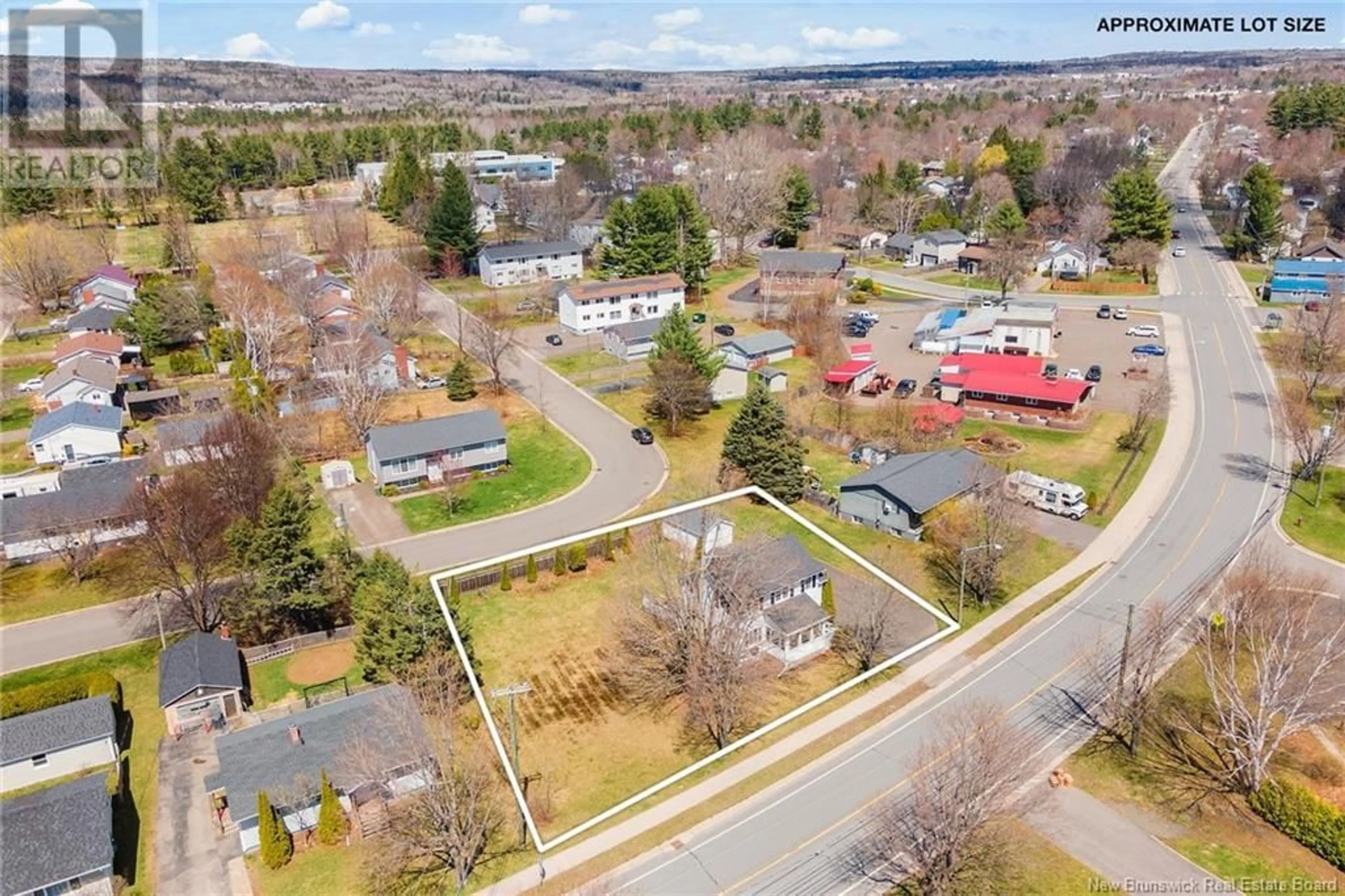 A pic from outside/outdoor area/front of a property/back of a property/a pic from drone, street for 201 SUNSET DRIVE, Fredericton New Brunswick E3A1A4