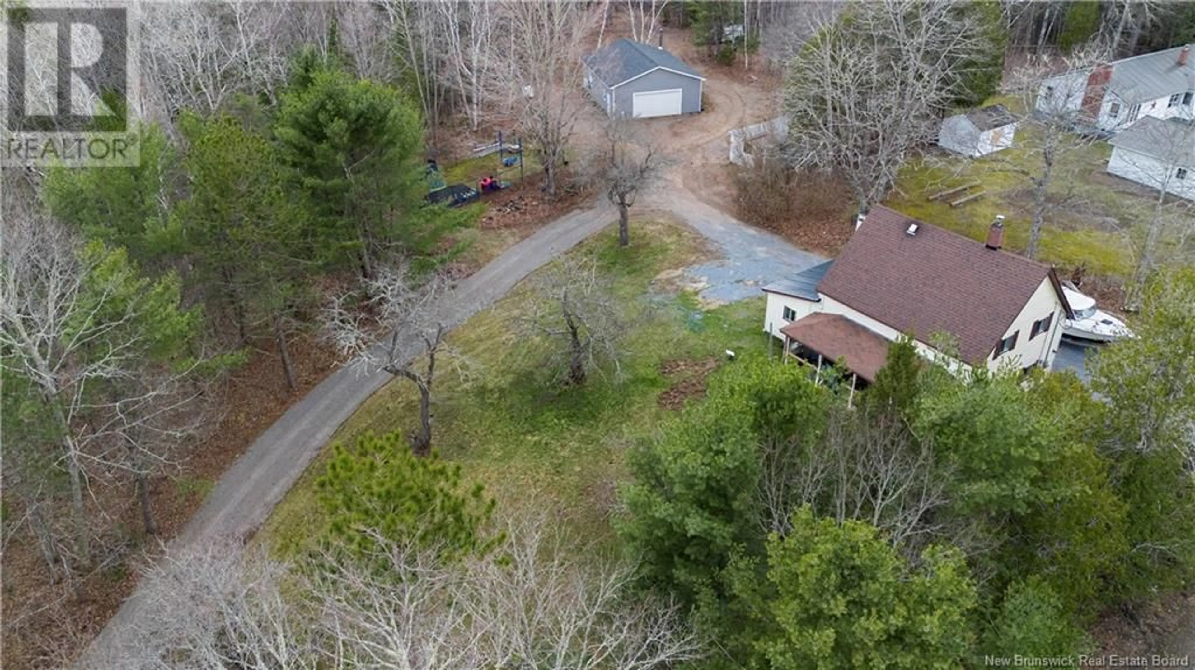 A pic from outside/outdoor area/front of a property/back of a property/a pic from drone, forest/trees view for 38 OAK POINT BEACH ROAD, Oak Point New Brunswick E5M2H8