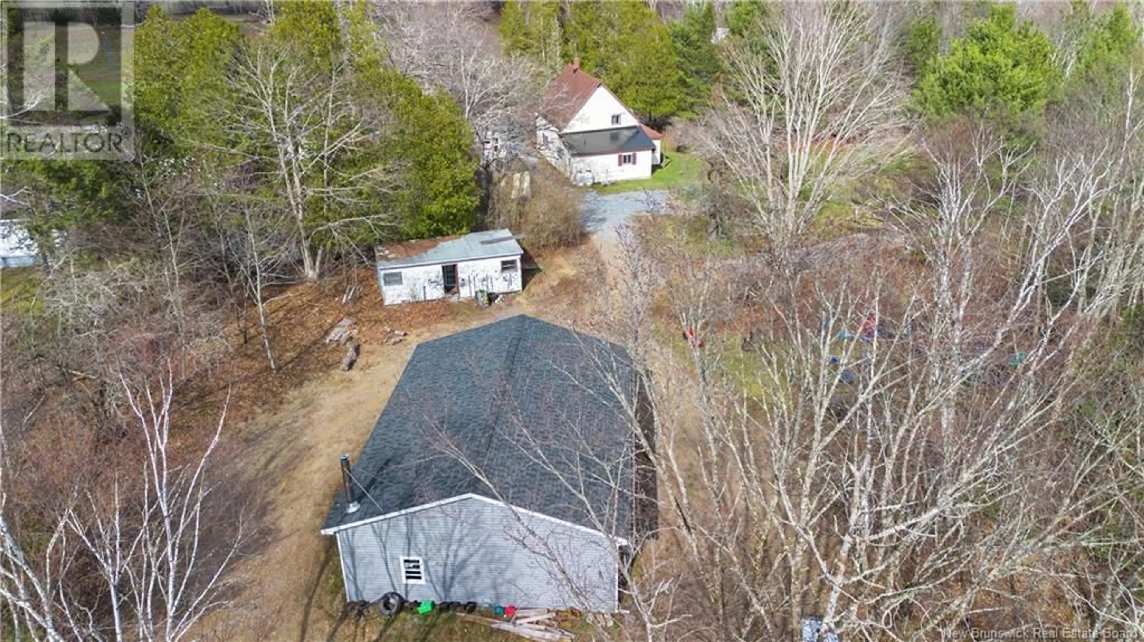 A pic from outside/outdoor area/front of a property/back of a property/a pic from drone, street for 38 OAK POINT BEACH ROAD, Oak Point New Brunswick E5M2H8