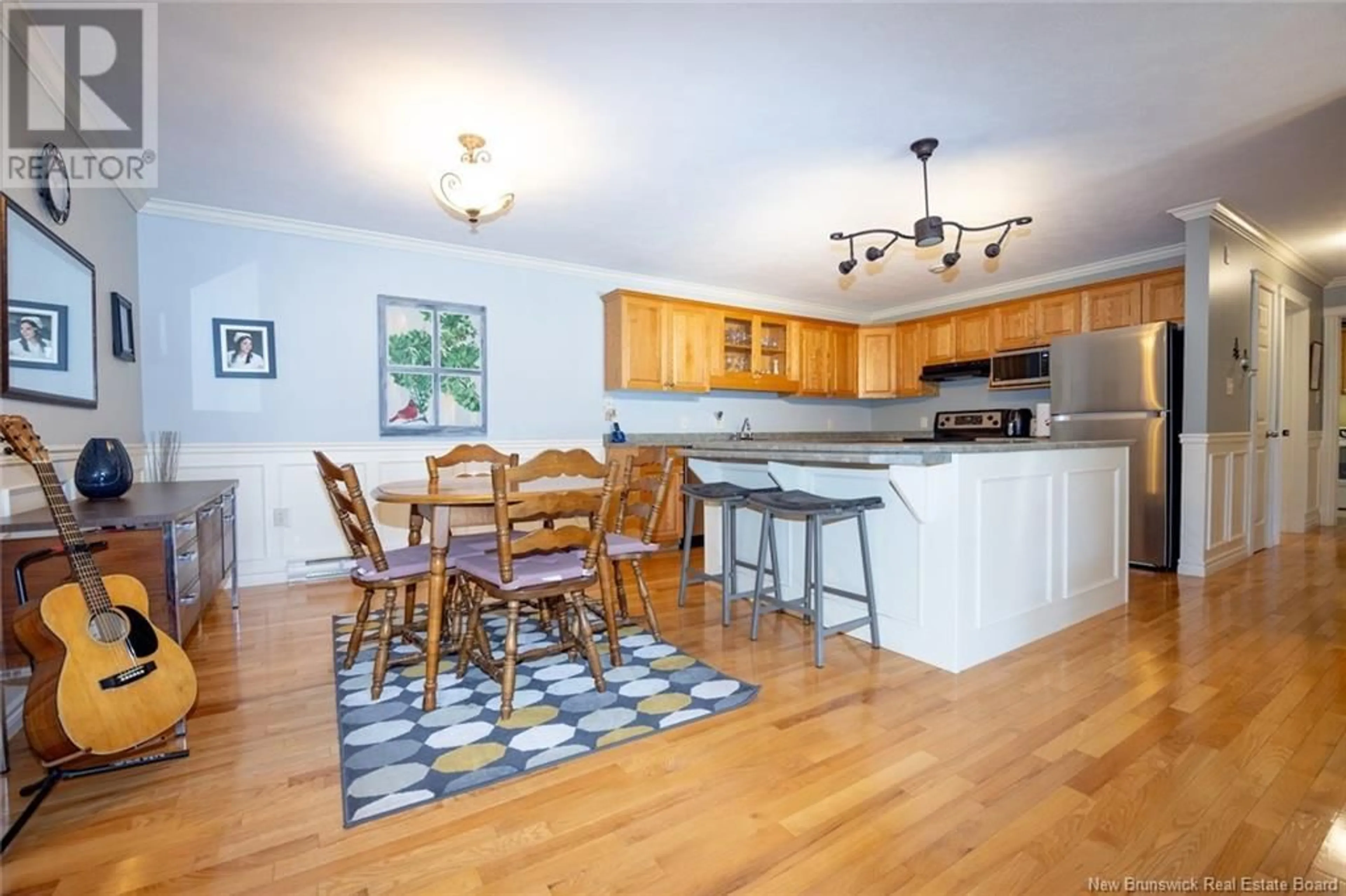 Open concept kitchen, wood/laminate floor for 6 - 175 REYNOLDS STREET, Fredericton New Brunswick E3A0H1